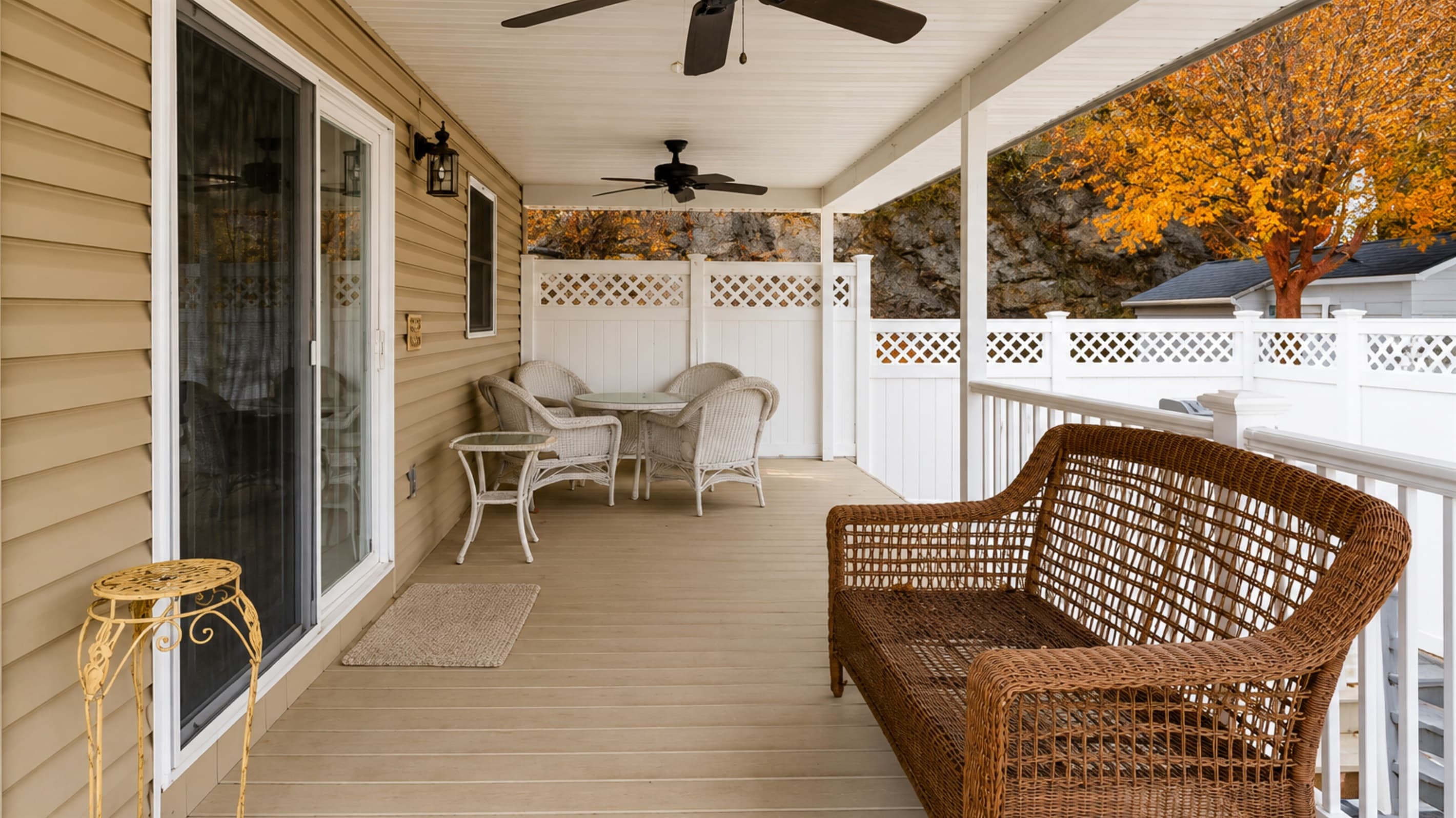 Covered porch with wicker seating