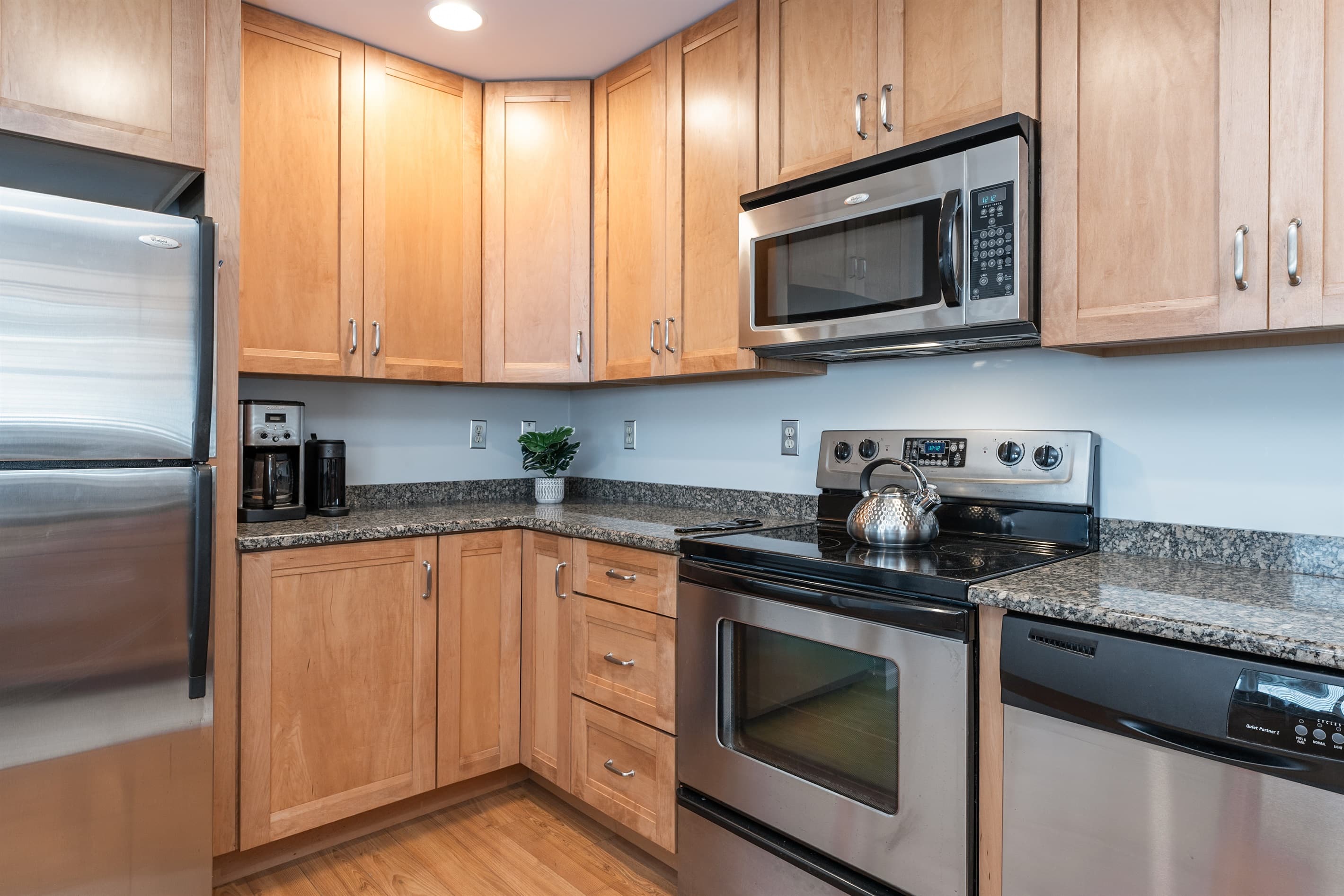 Galley kitchen with stainless steel appliances
