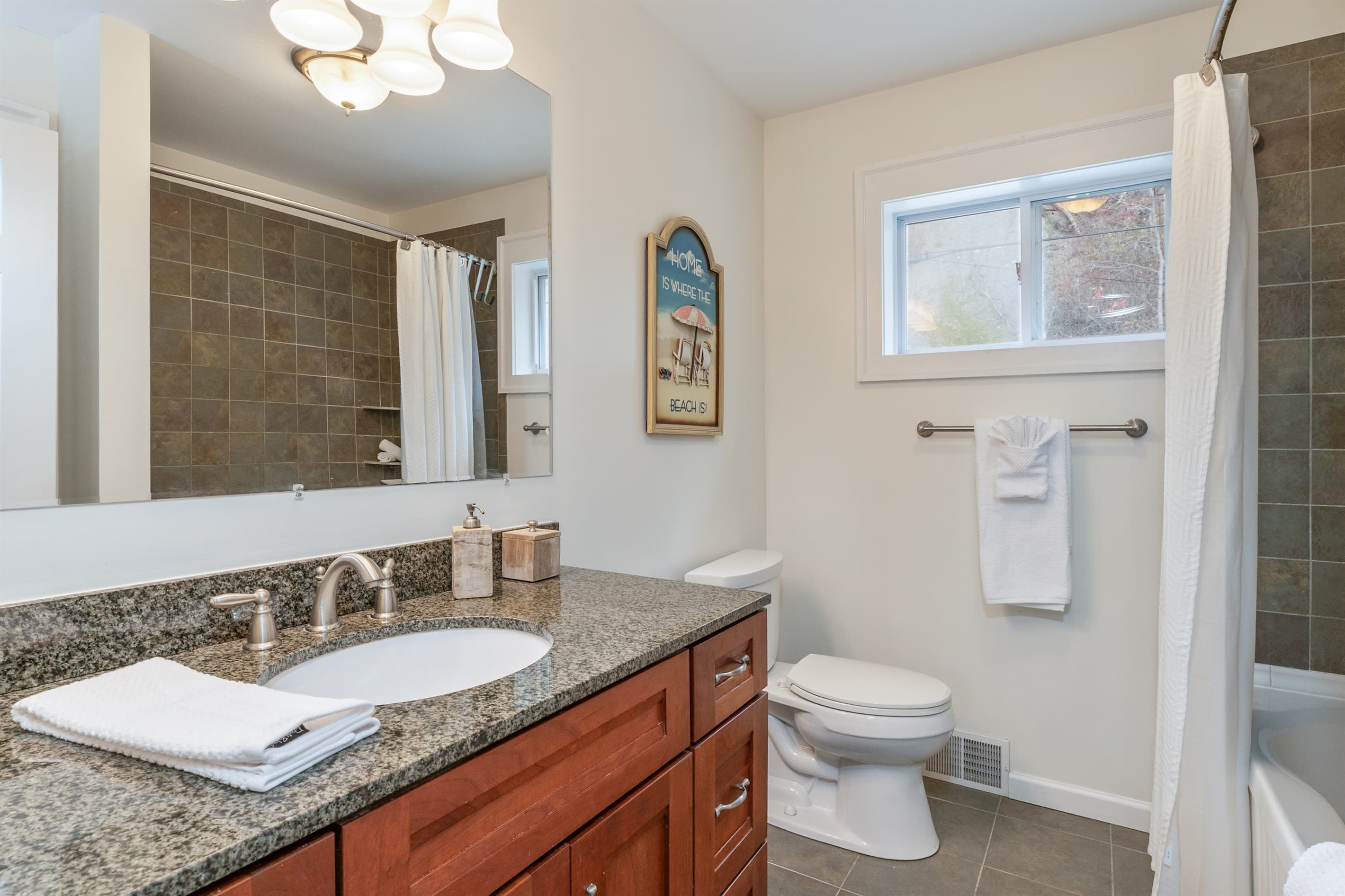 Upstairs bathroom with jetted bathtub