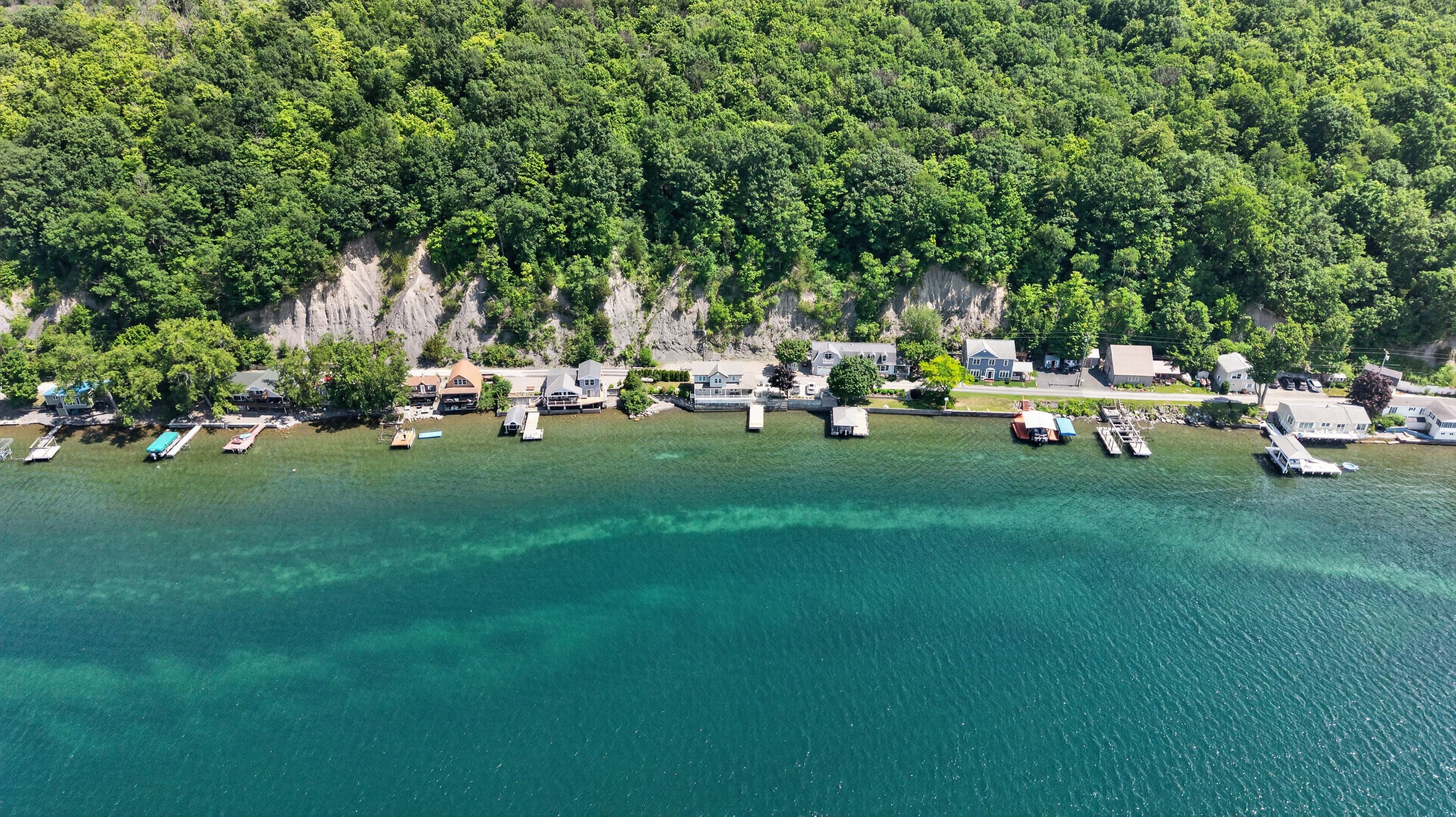 Clear water along the residential shoreline