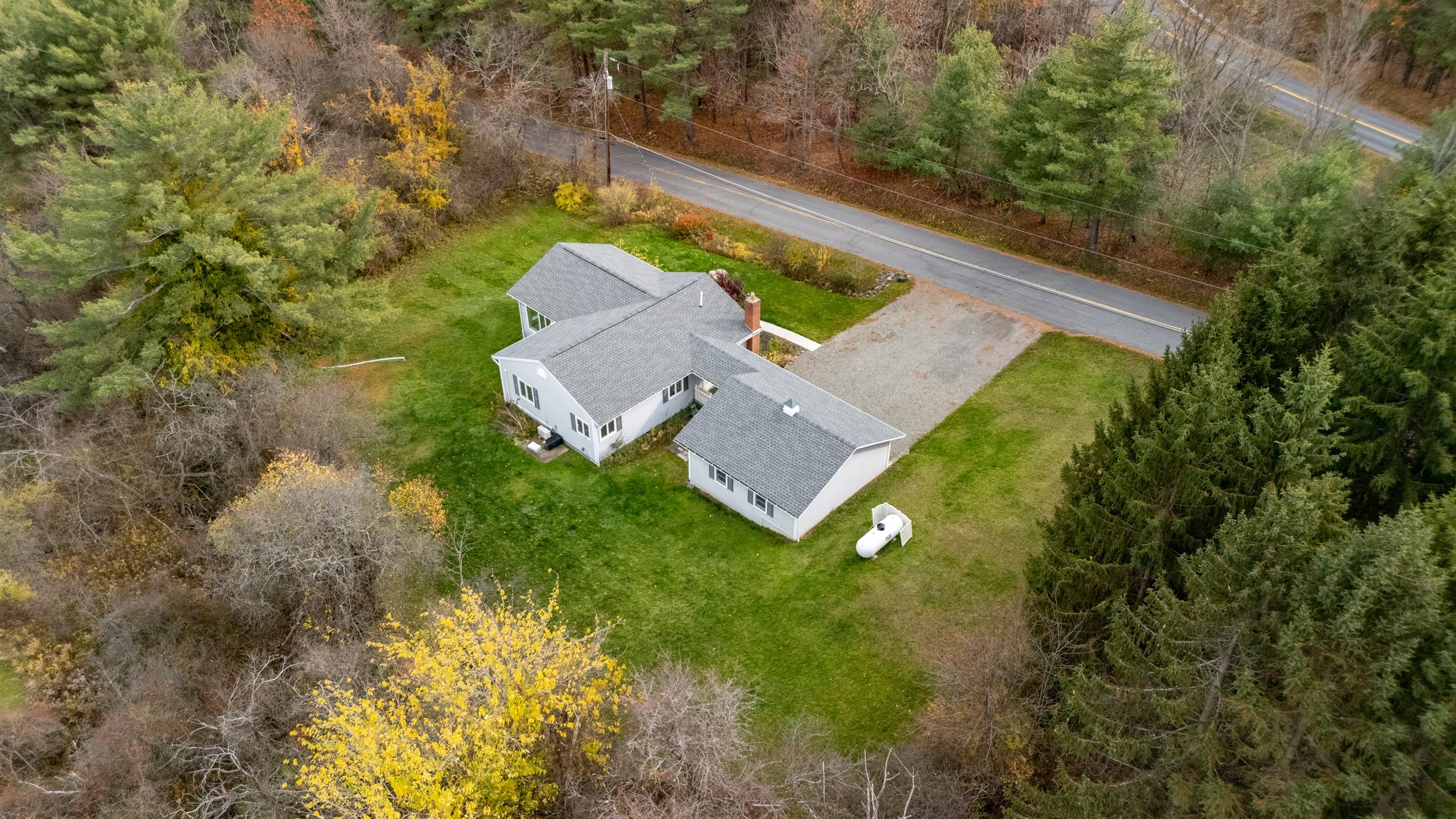 Aerial view of the home and yard
