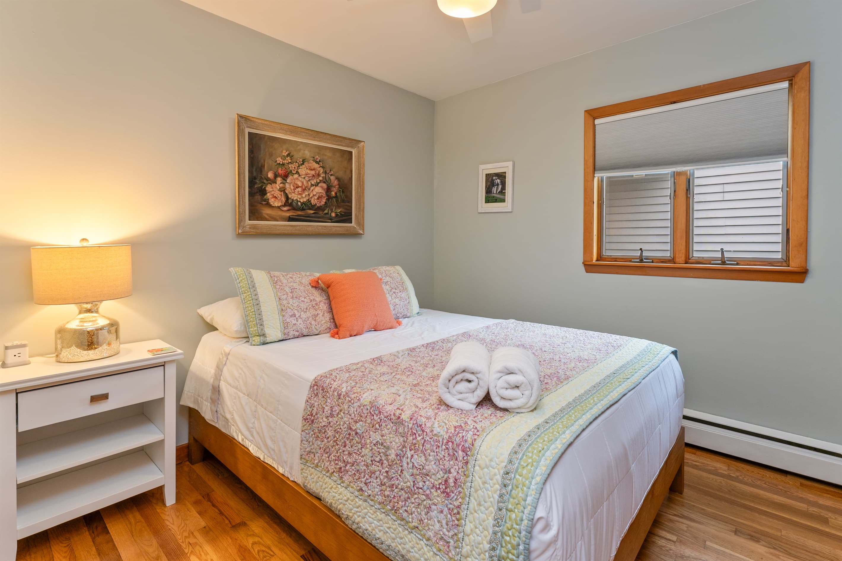 Queen bedroom with colorful bedding