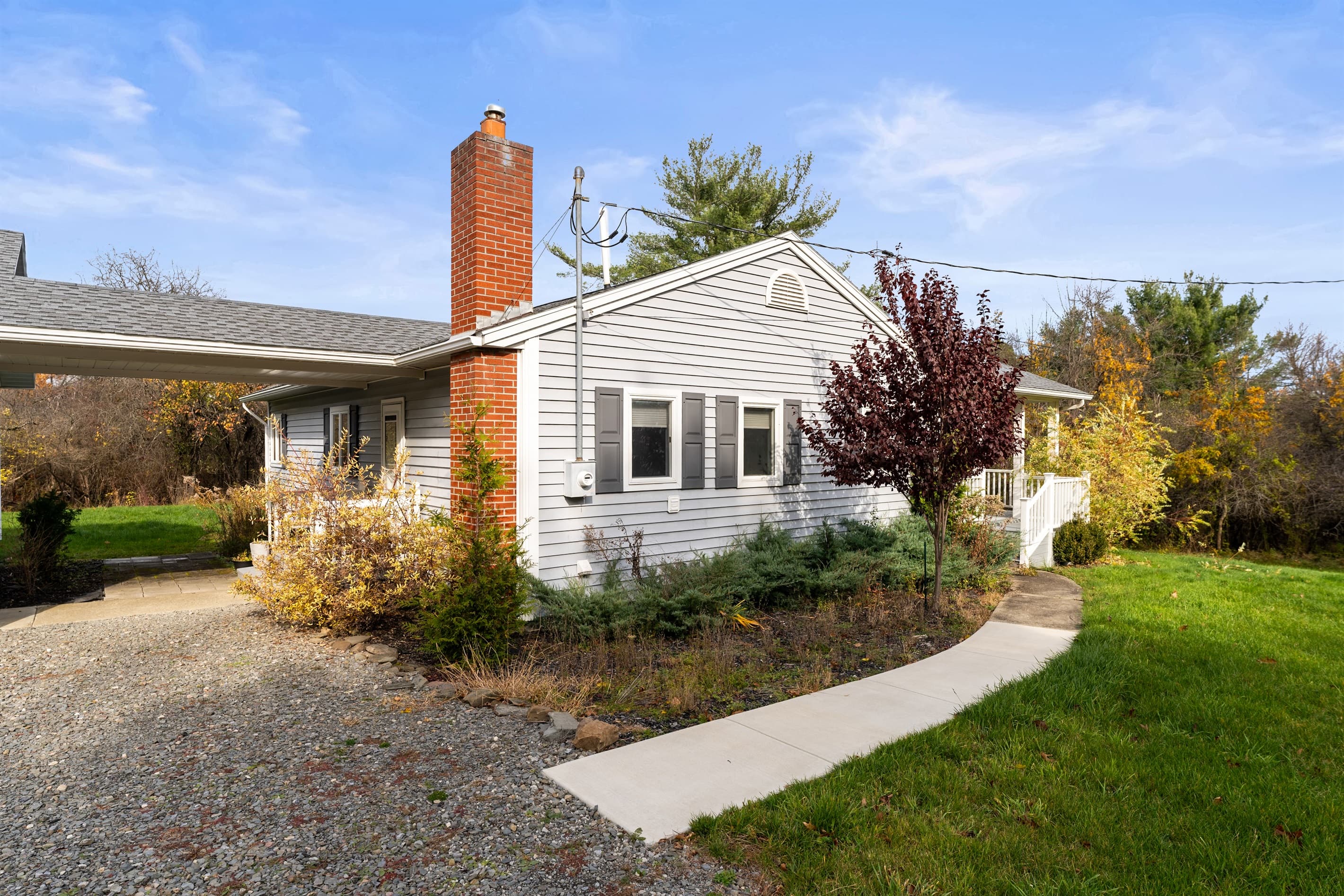 Front exterior with landscaped walkway