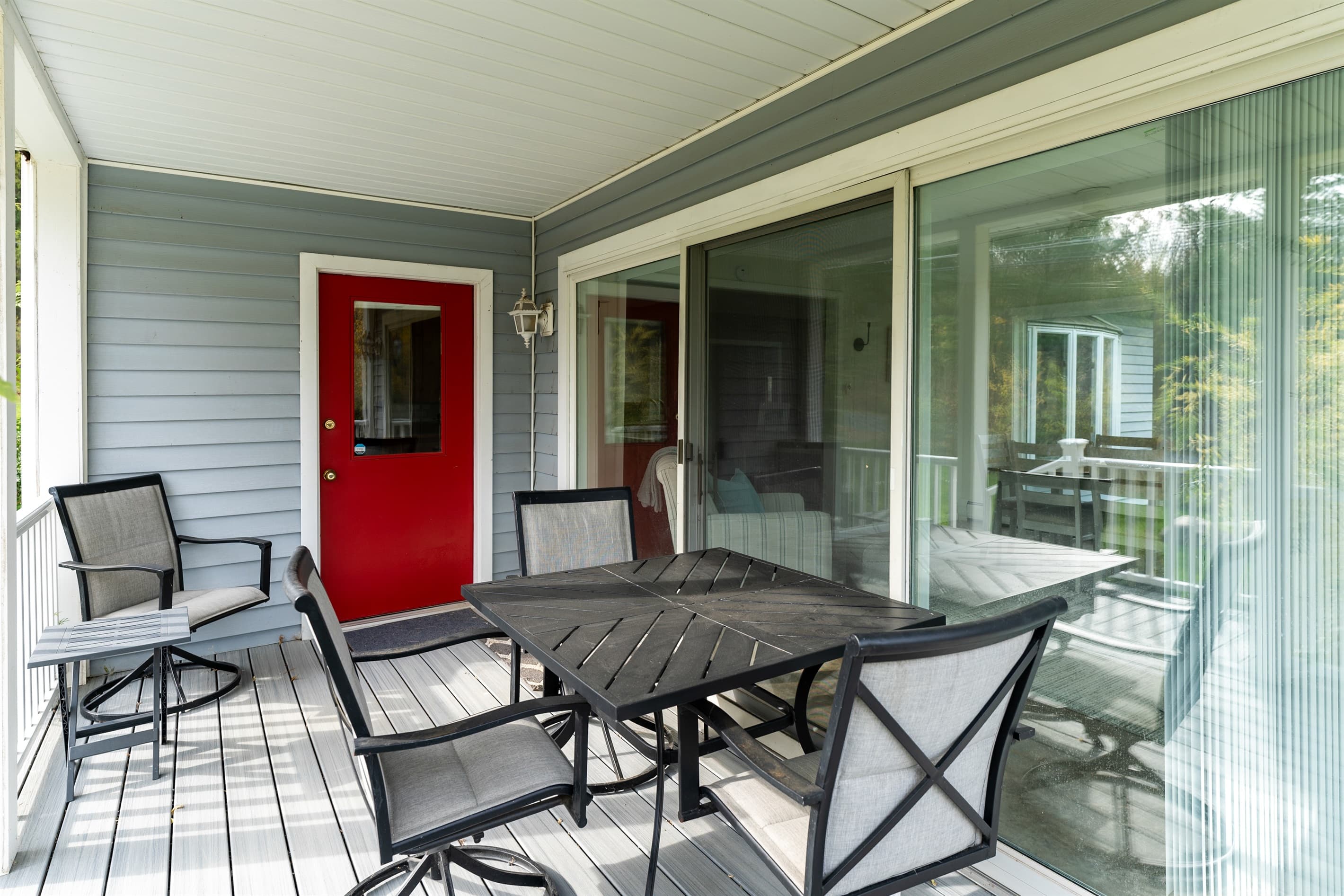 Furnished deck with outdoor dining area