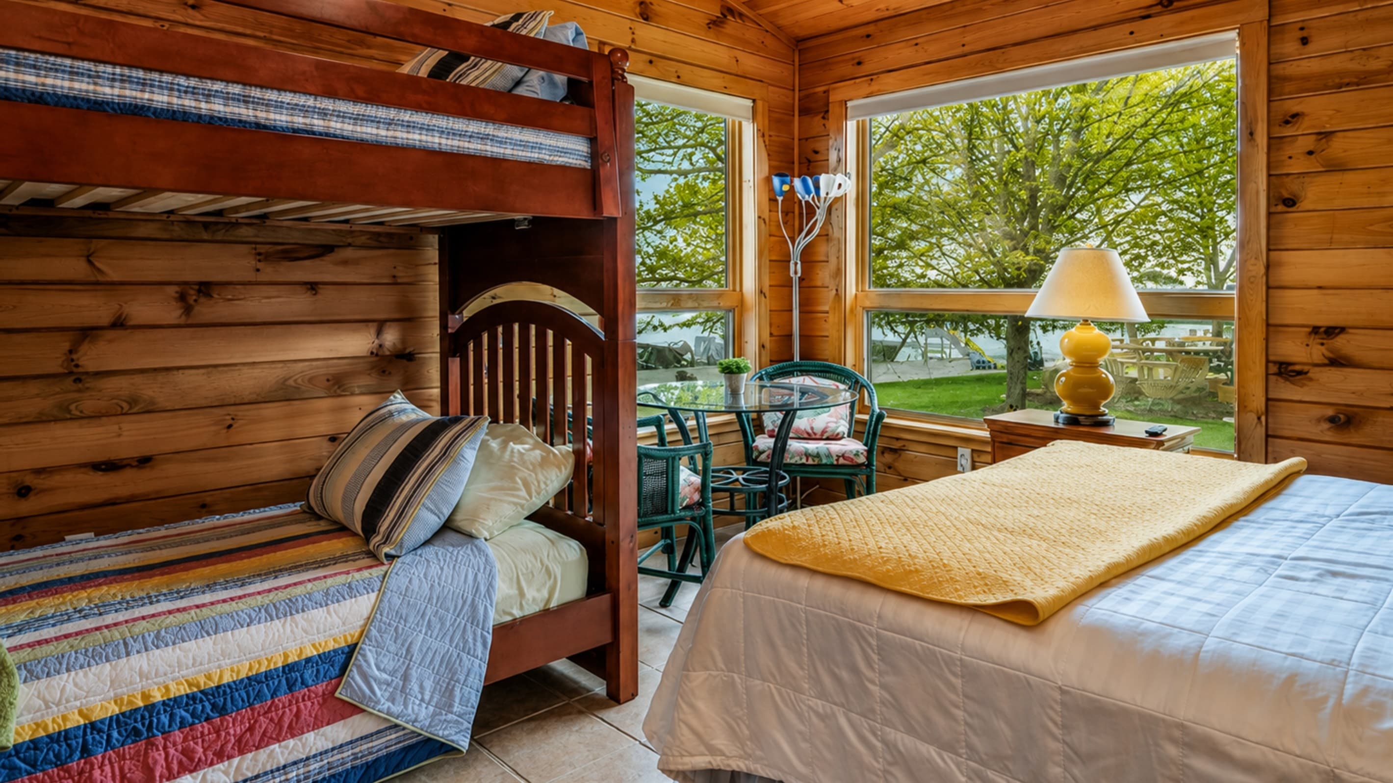 Bedroom with bunk bed and large windows