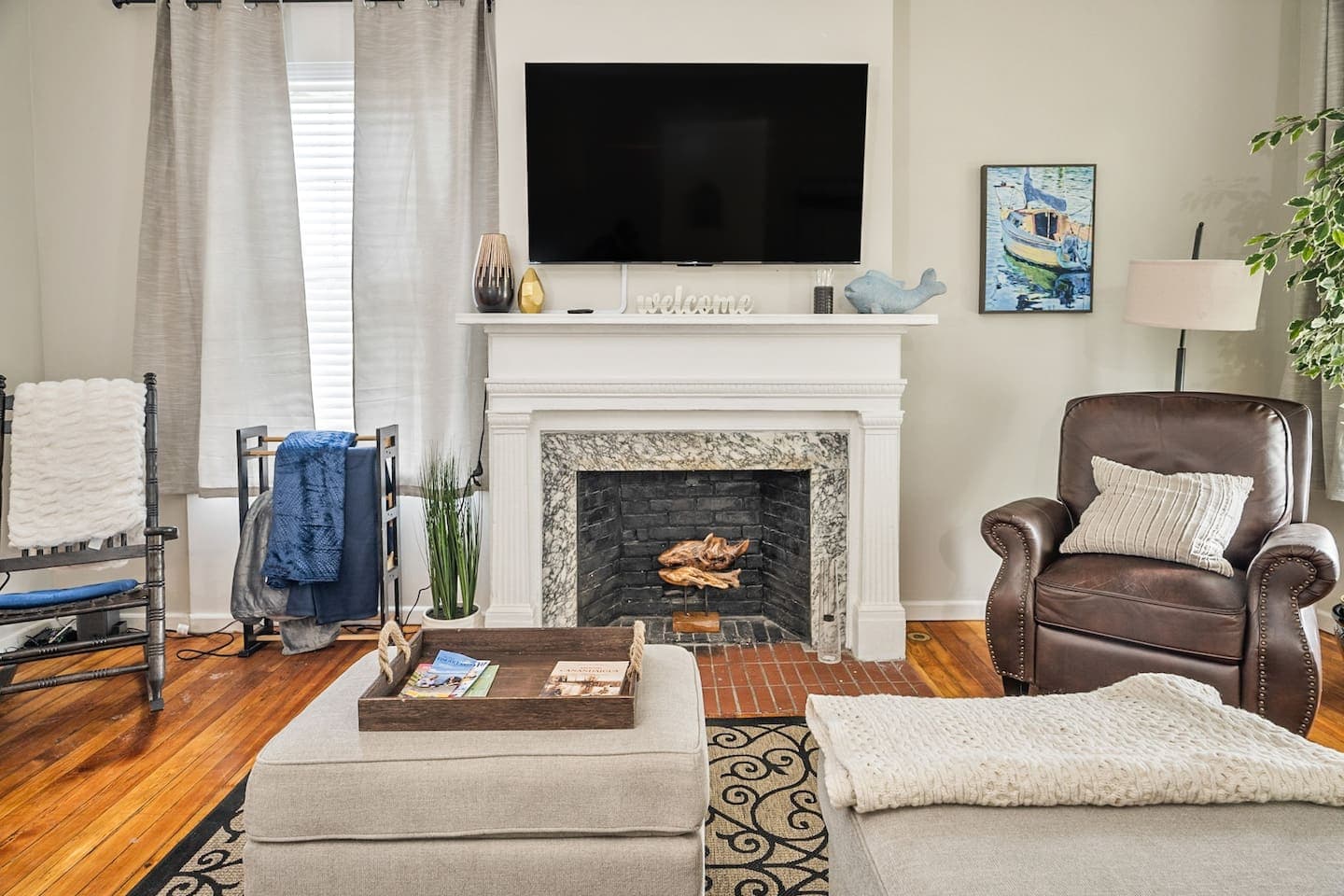 Fireplace seating area with television