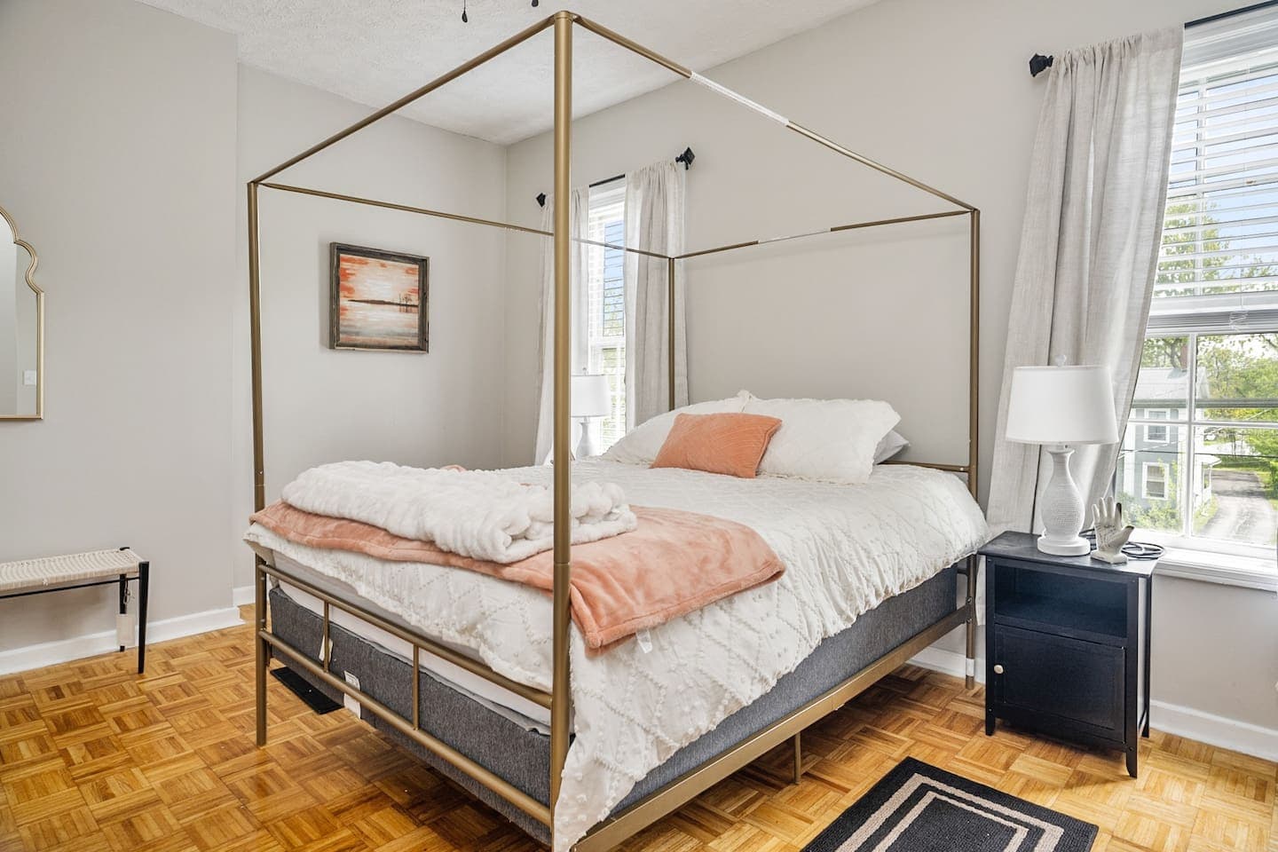 Main bedroom with canopy queen bed