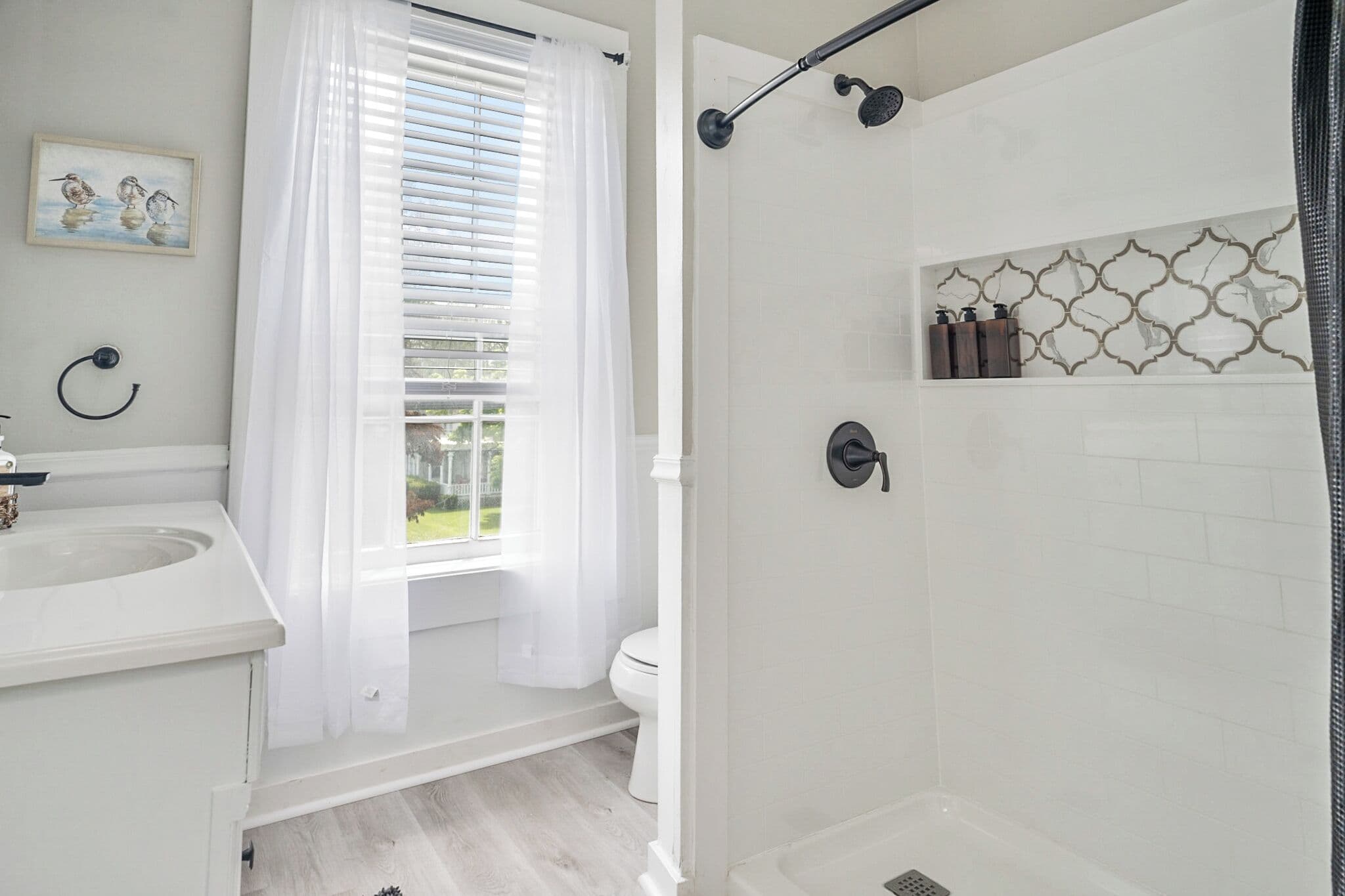 Bathroom with walk-in tiled shower