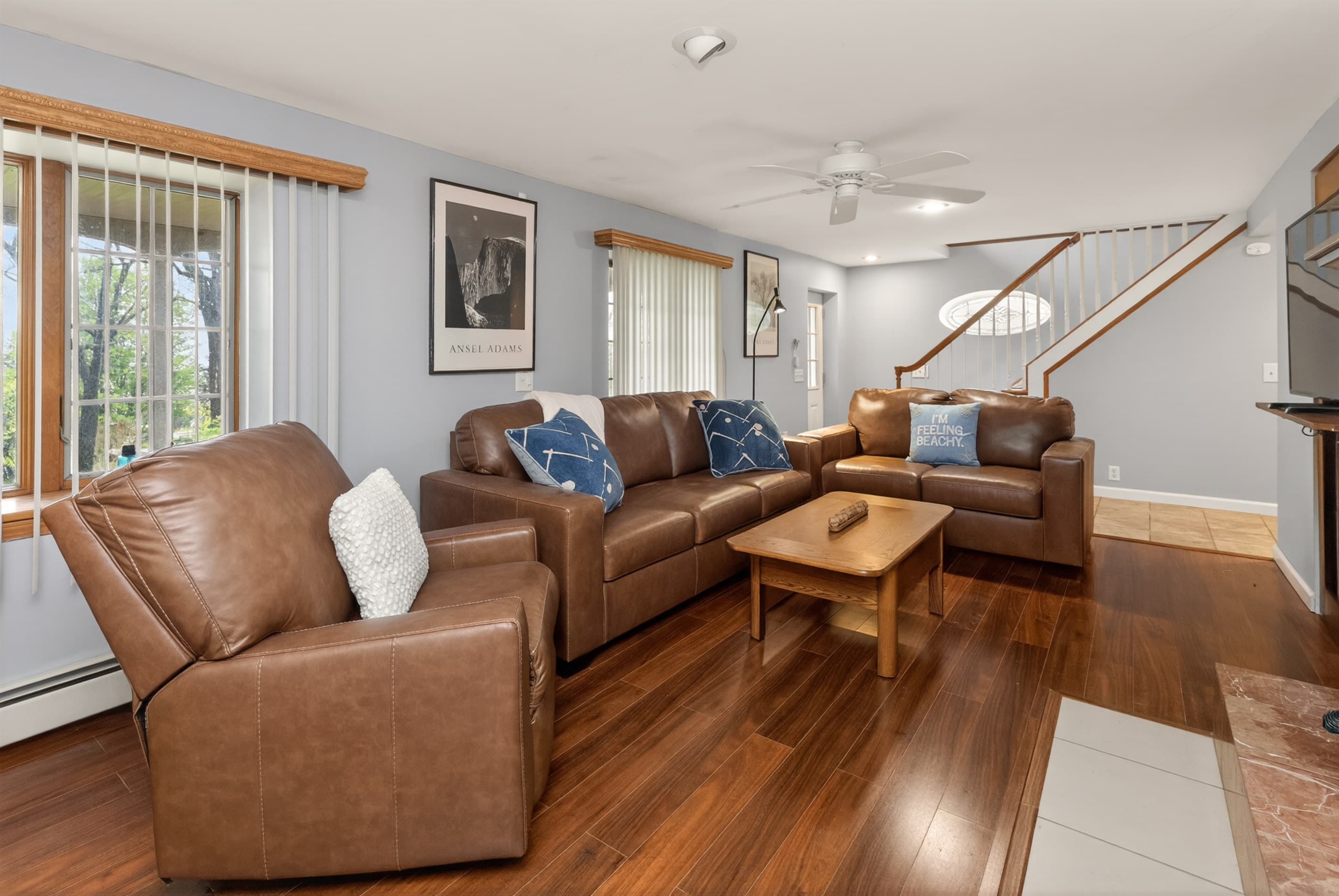 Dining table beside large windows