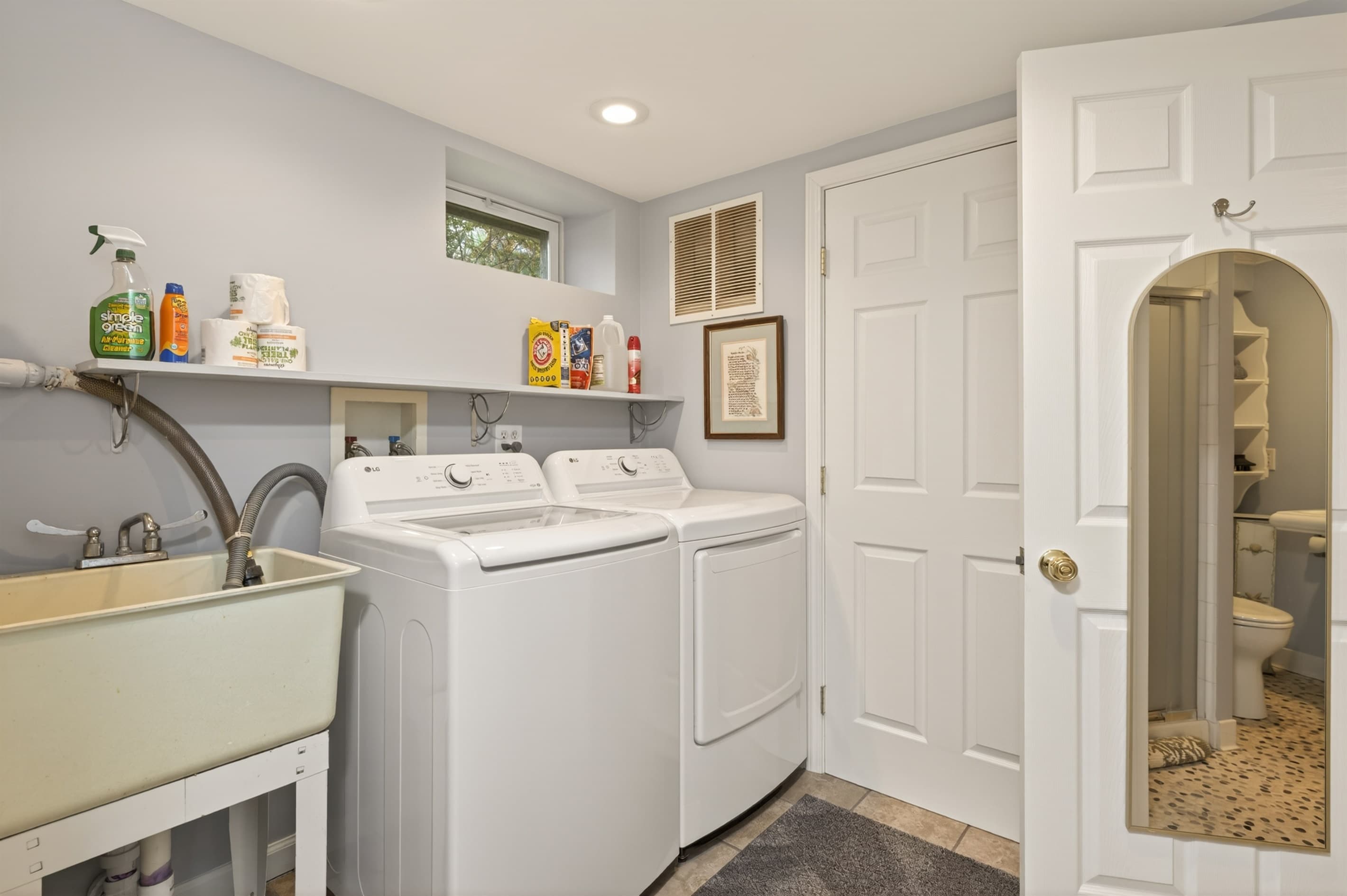 Bathroom with double vanity and large mirror