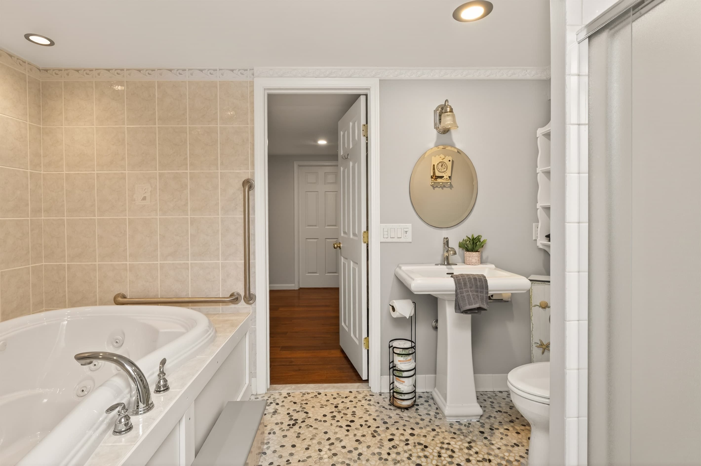 Full bathroom with bathtub and toilet