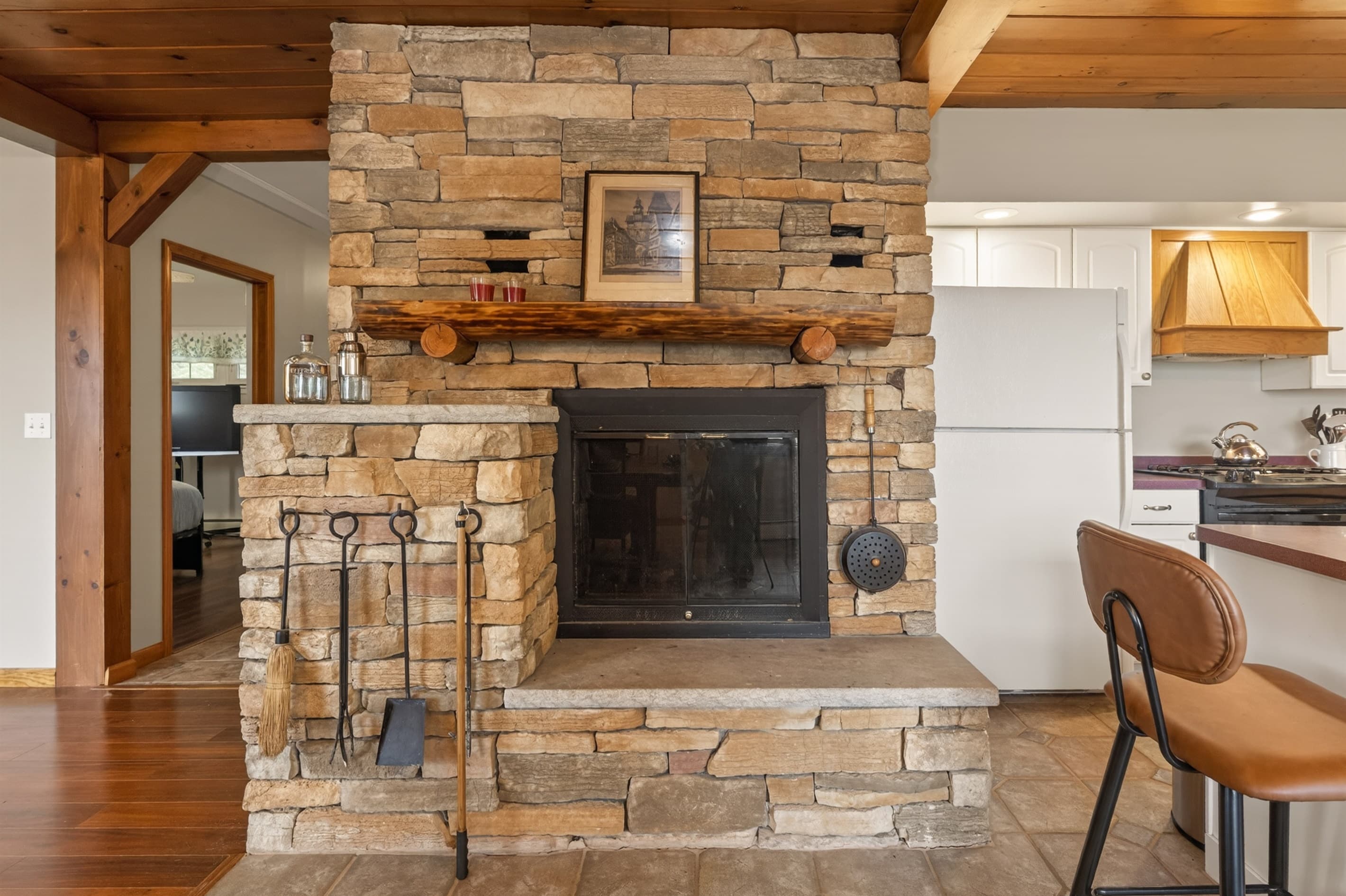 Stone fireplace with built-in wood storage