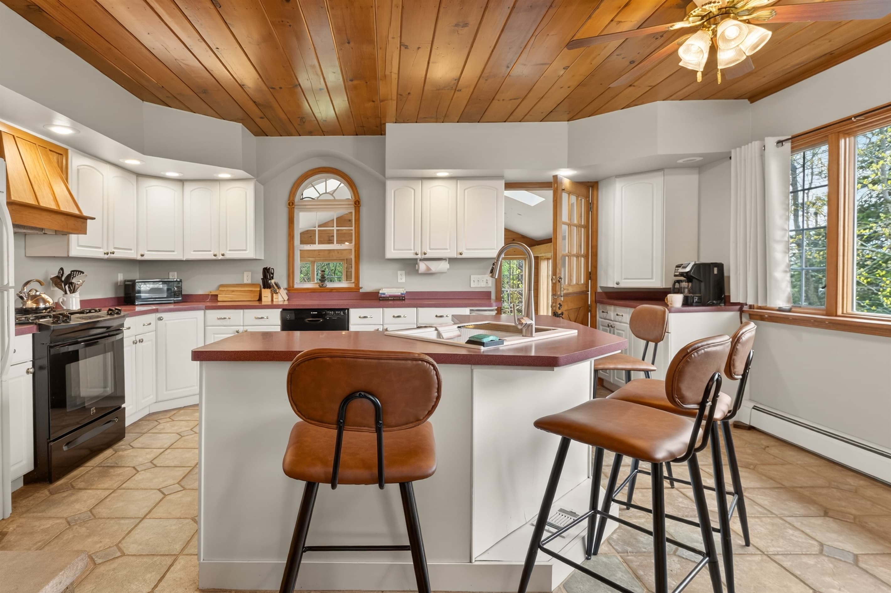 Breakfast bar with cushioned counter stools