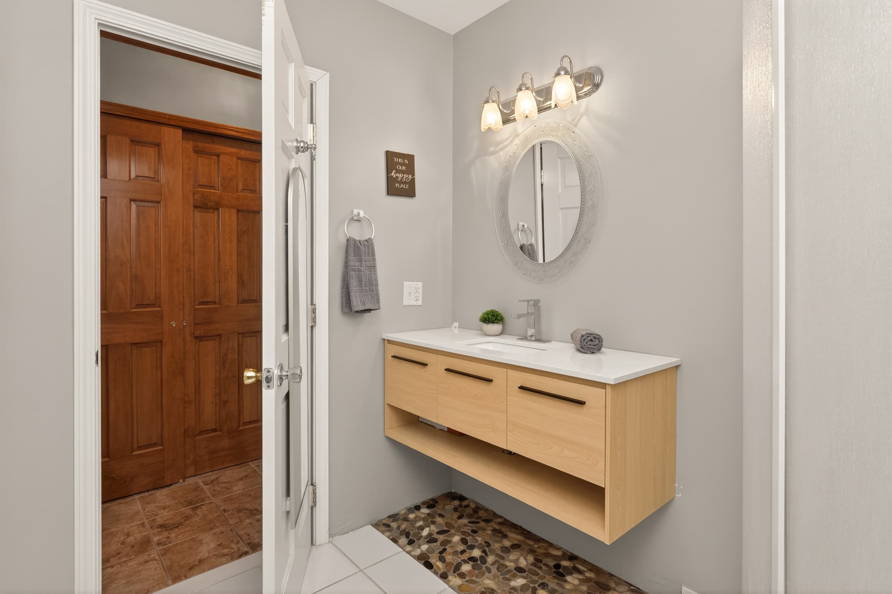 Bathroom vanity beside the toilet