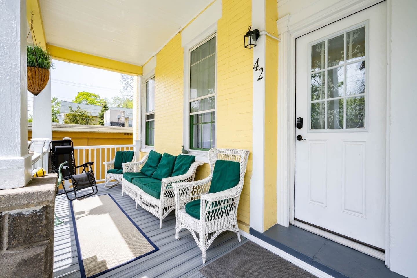 Covered porch with cushioned bench seating