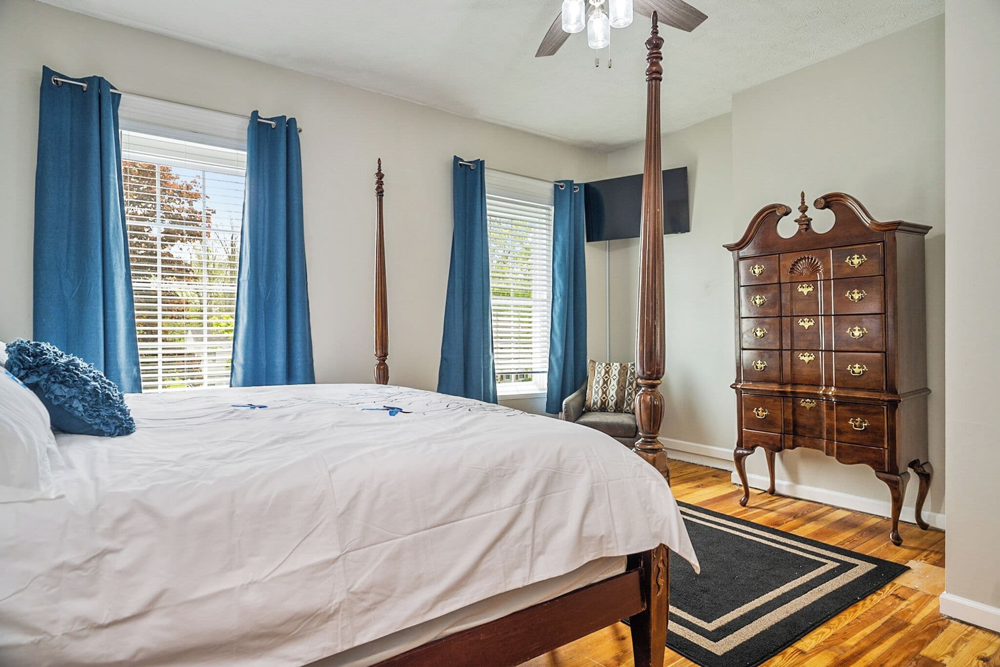 Primary bedroom with four-poster bed
