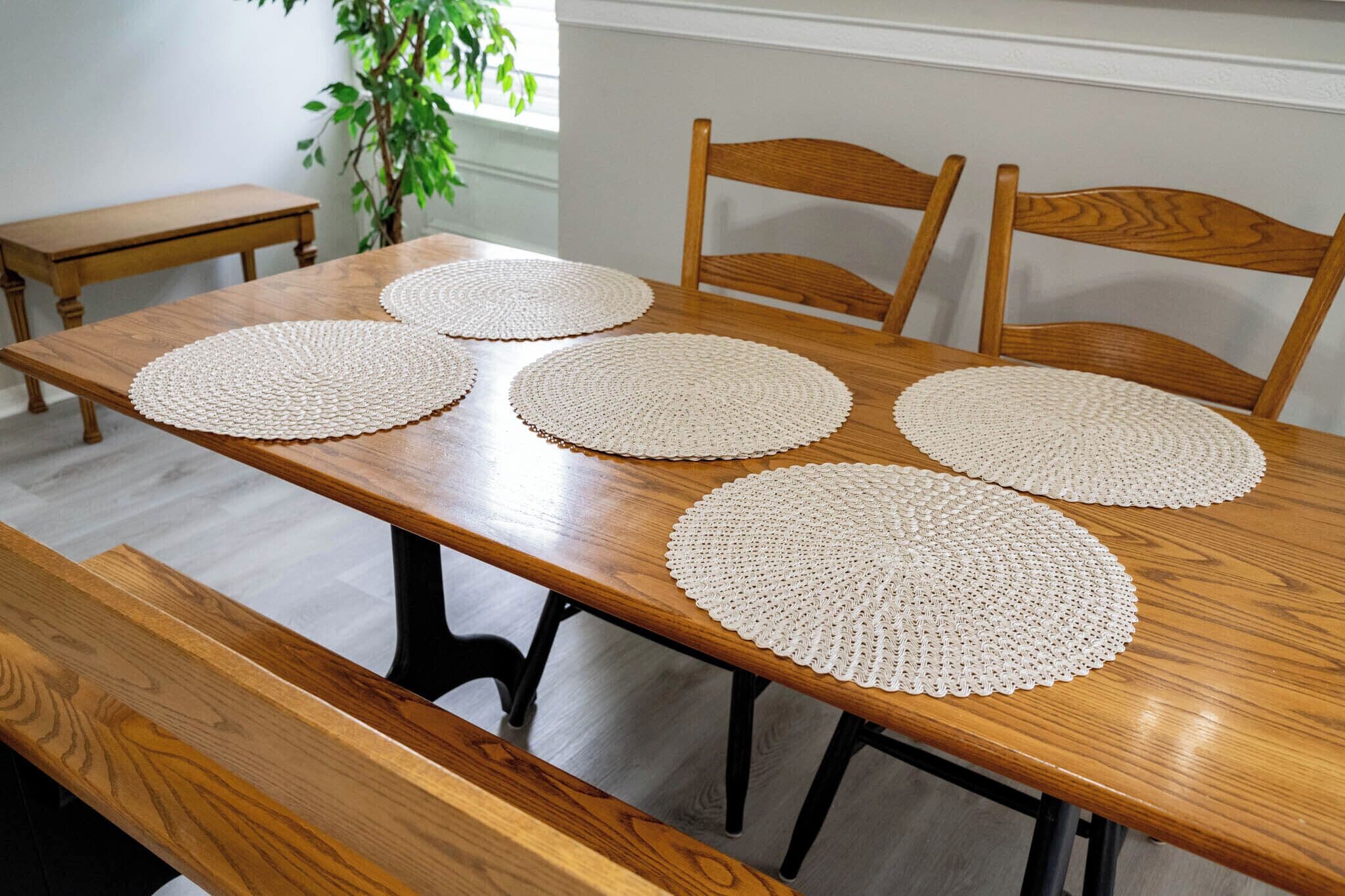 Wooden dining table with four chairs