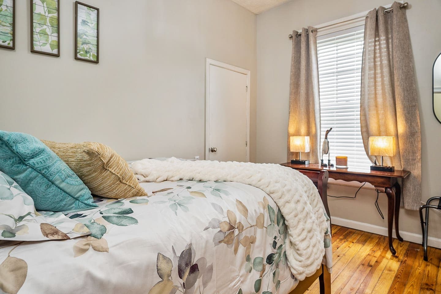 Full bedroom with desk and window