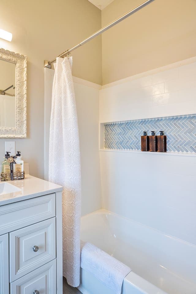 Bathroom with tub and shower