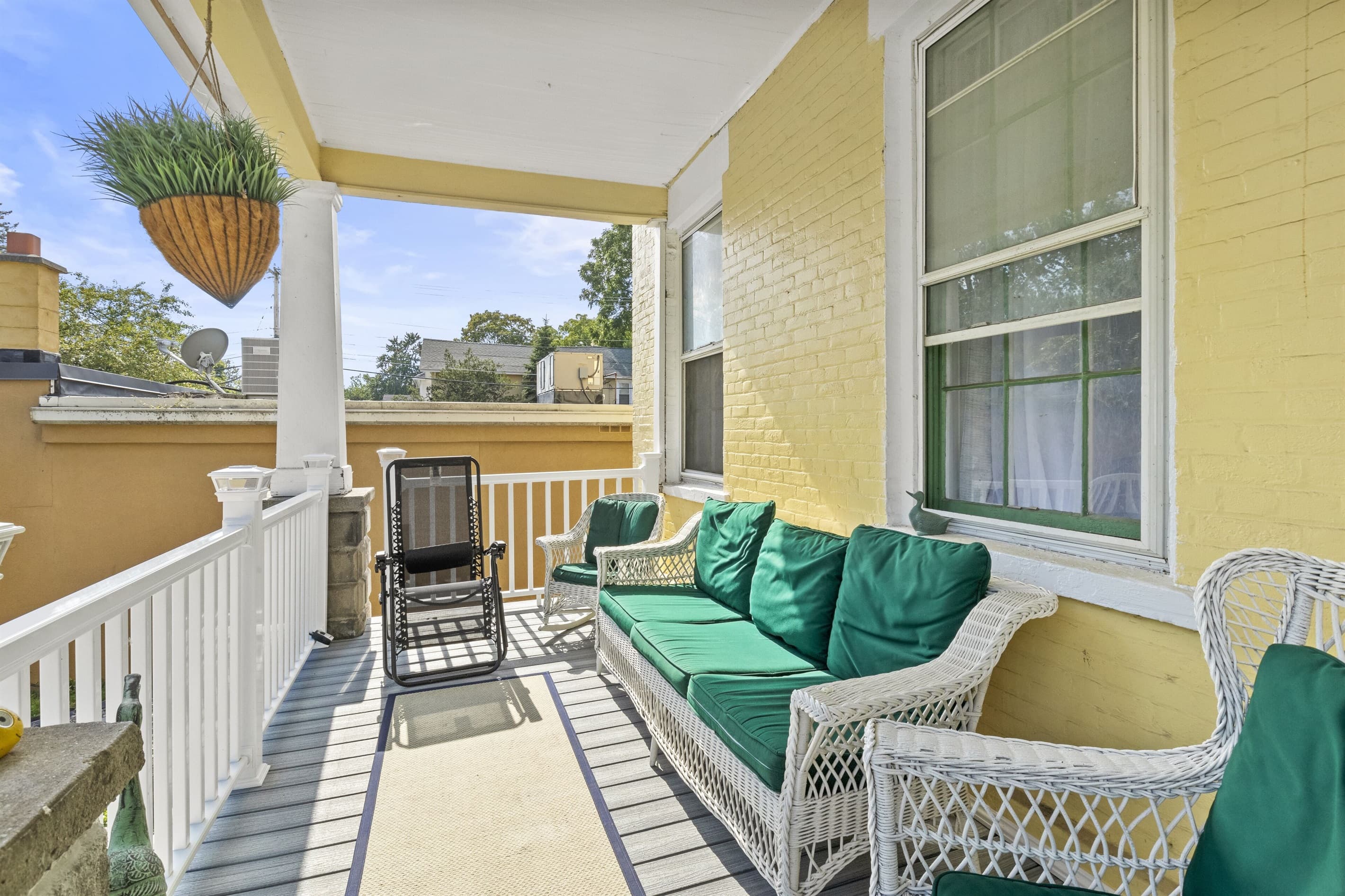 Covered porch with cushioned bench