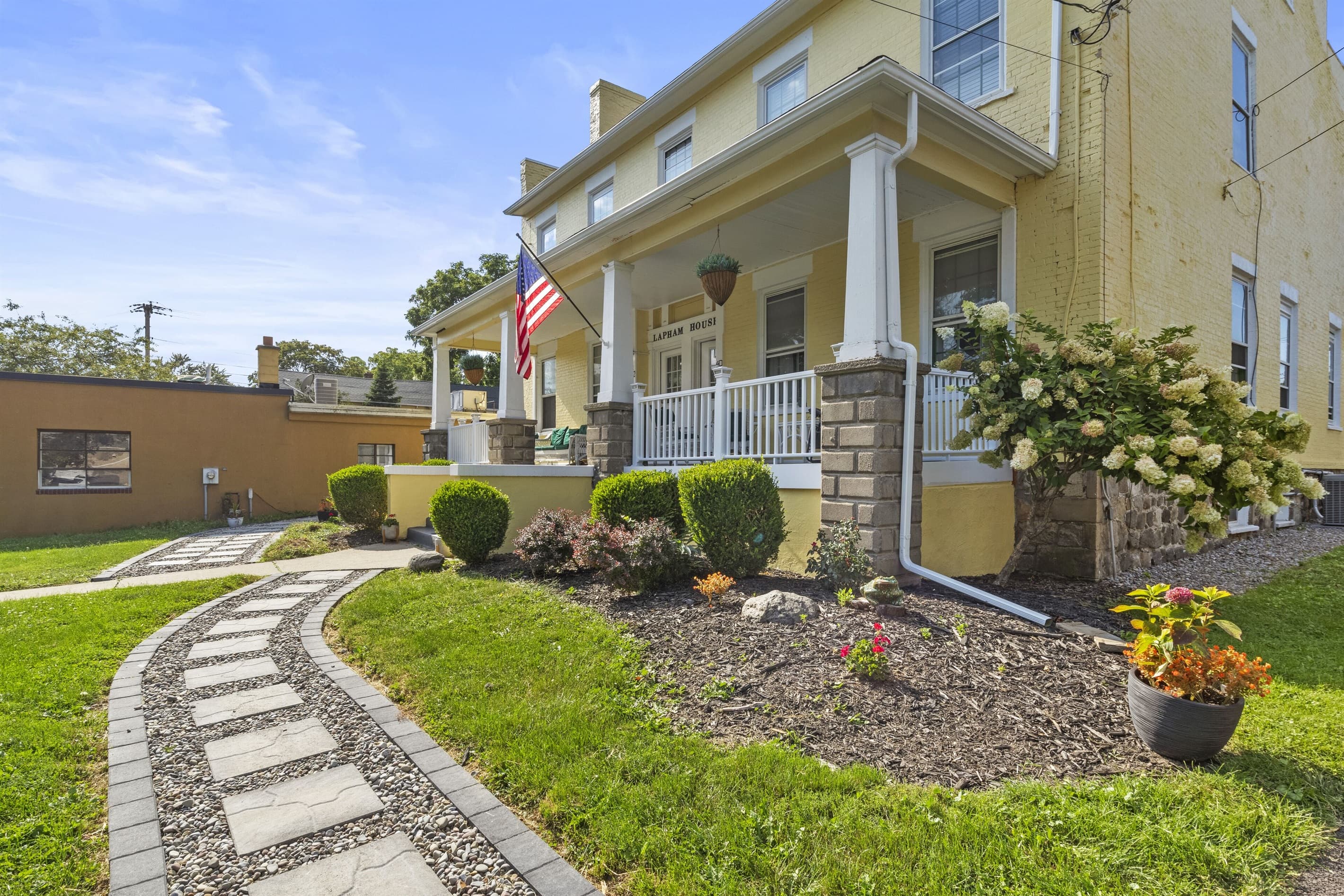 Landscaped path leading to the porch