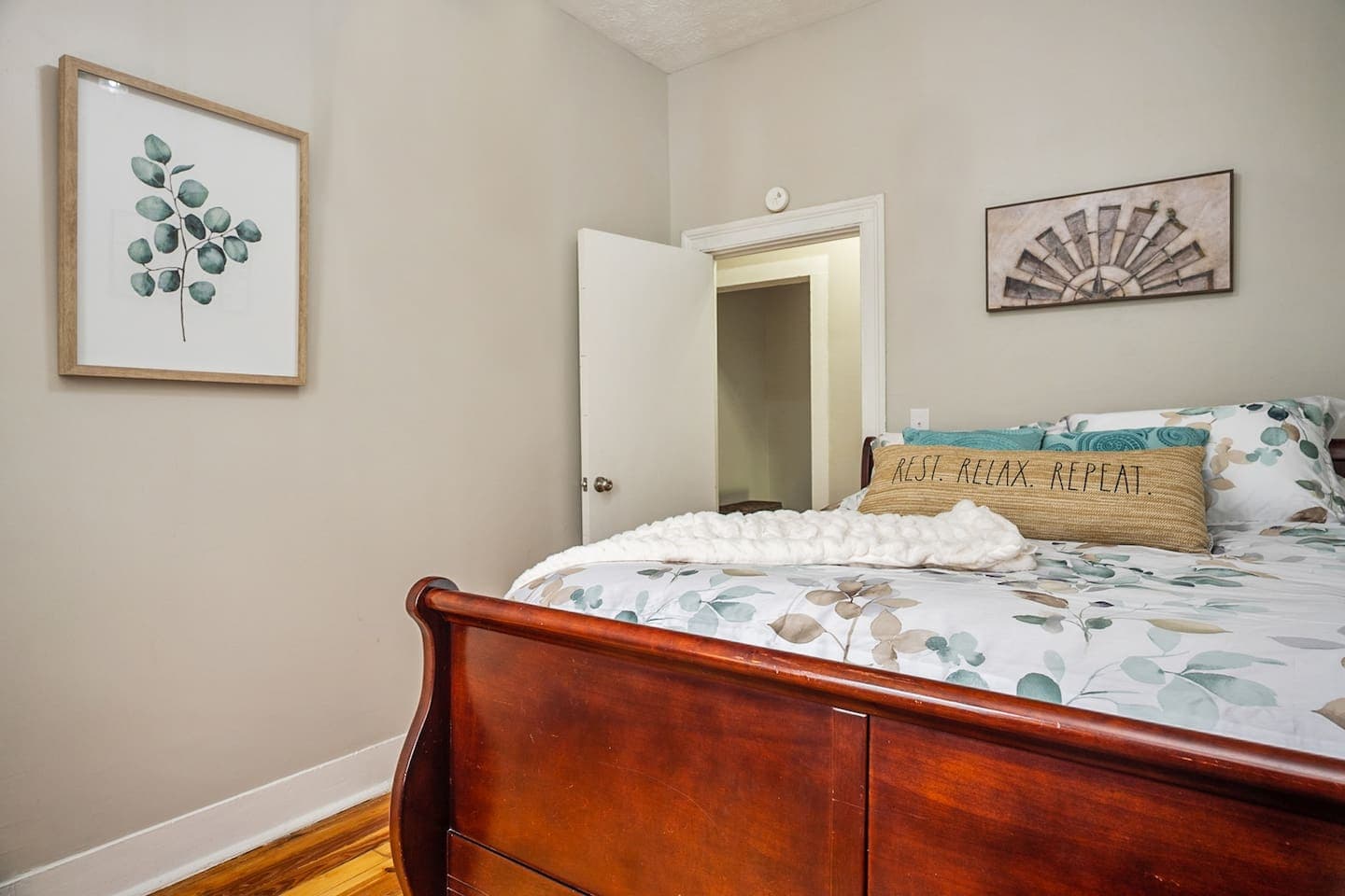 Full bedroom with botanical bedding
