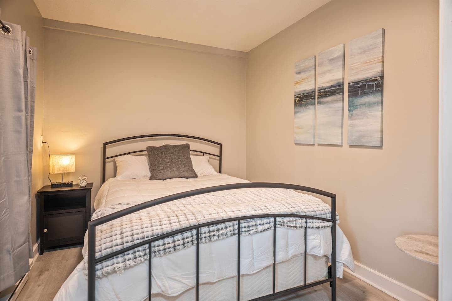 Unit 42.5 queen bedroom with bedside lighting