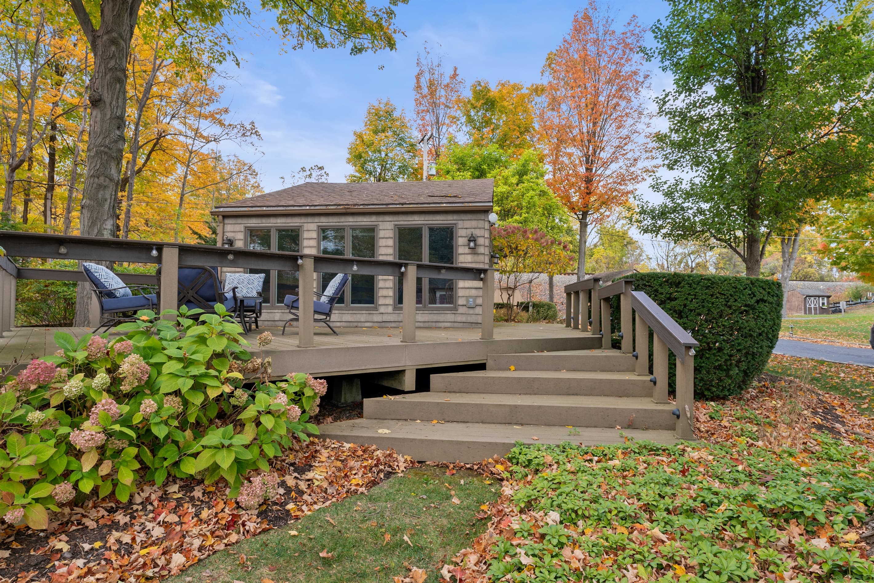 Main entrance with spacious wooden deck