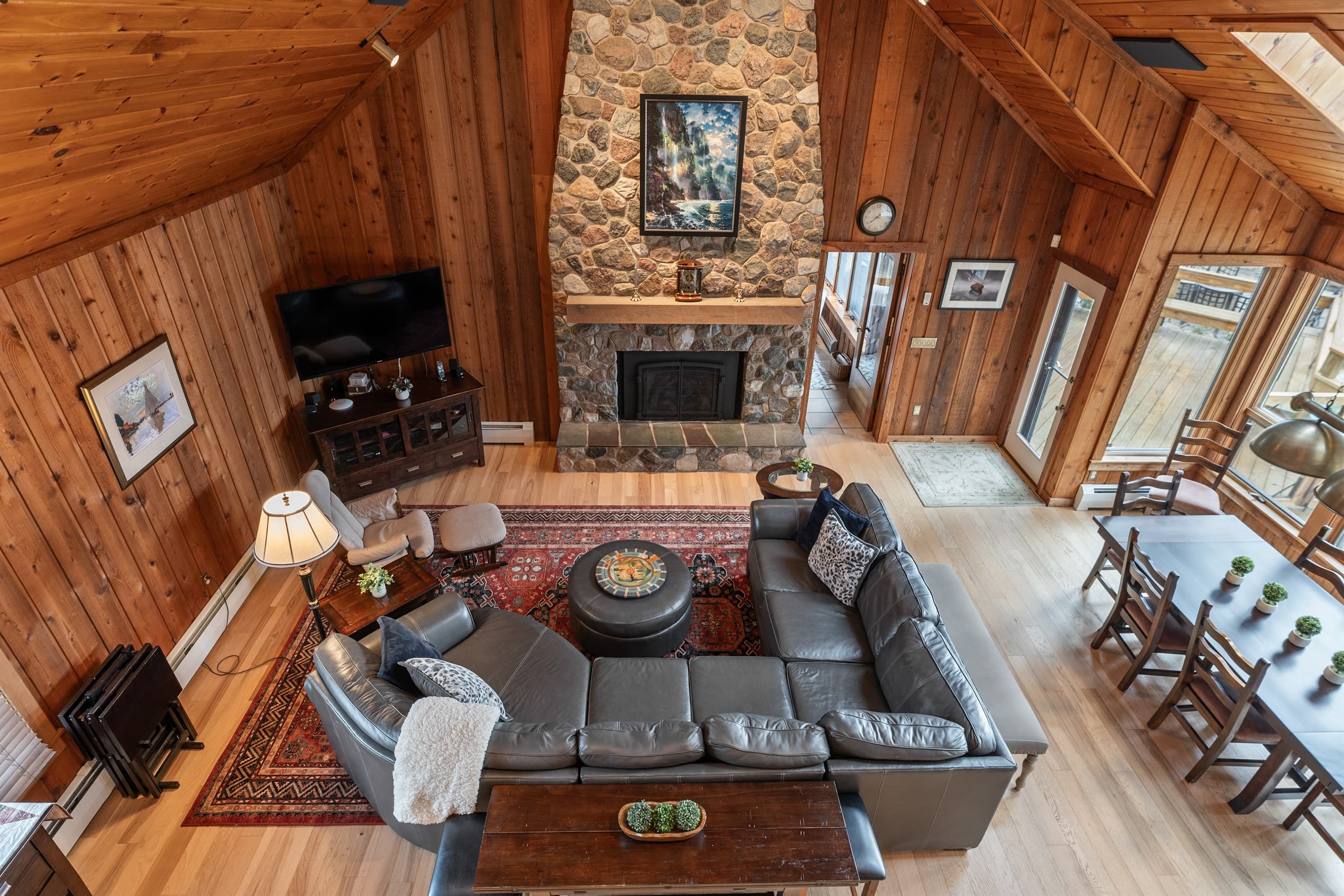 Great room with fireplace and leather seating