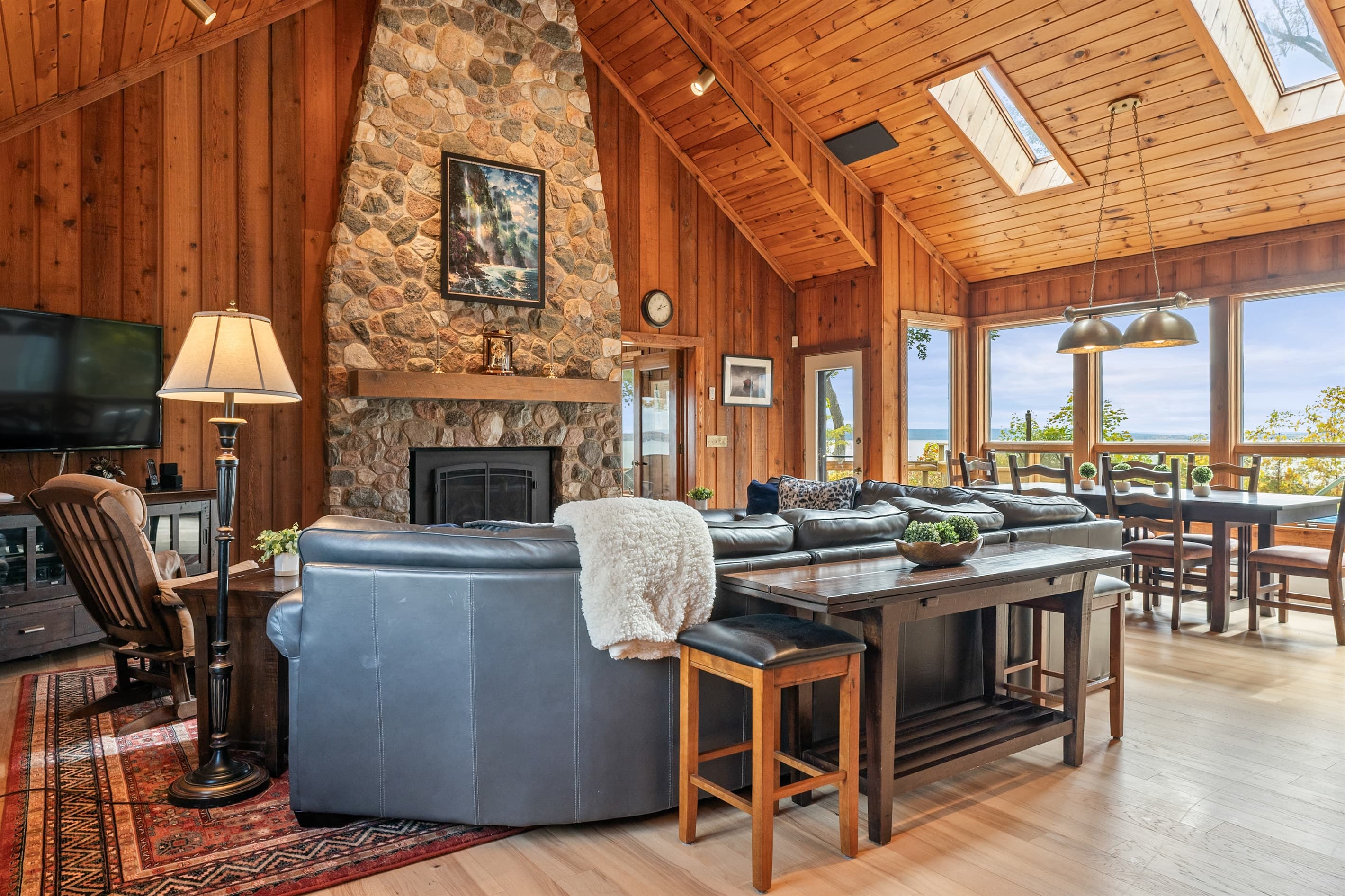 Open living area beneath vaulted ceilings