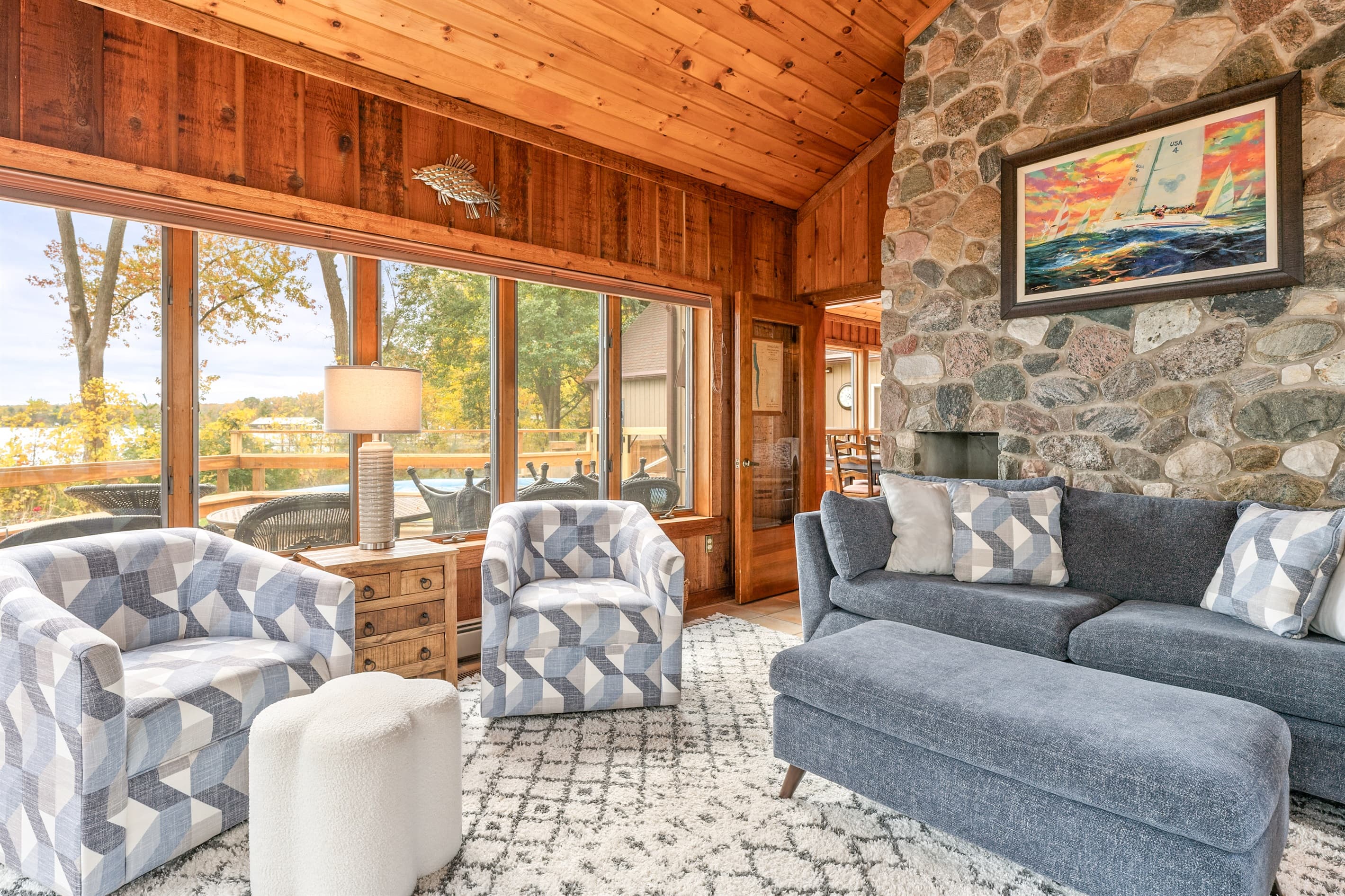 Fireside seating with floor-to-ceiling lake views
