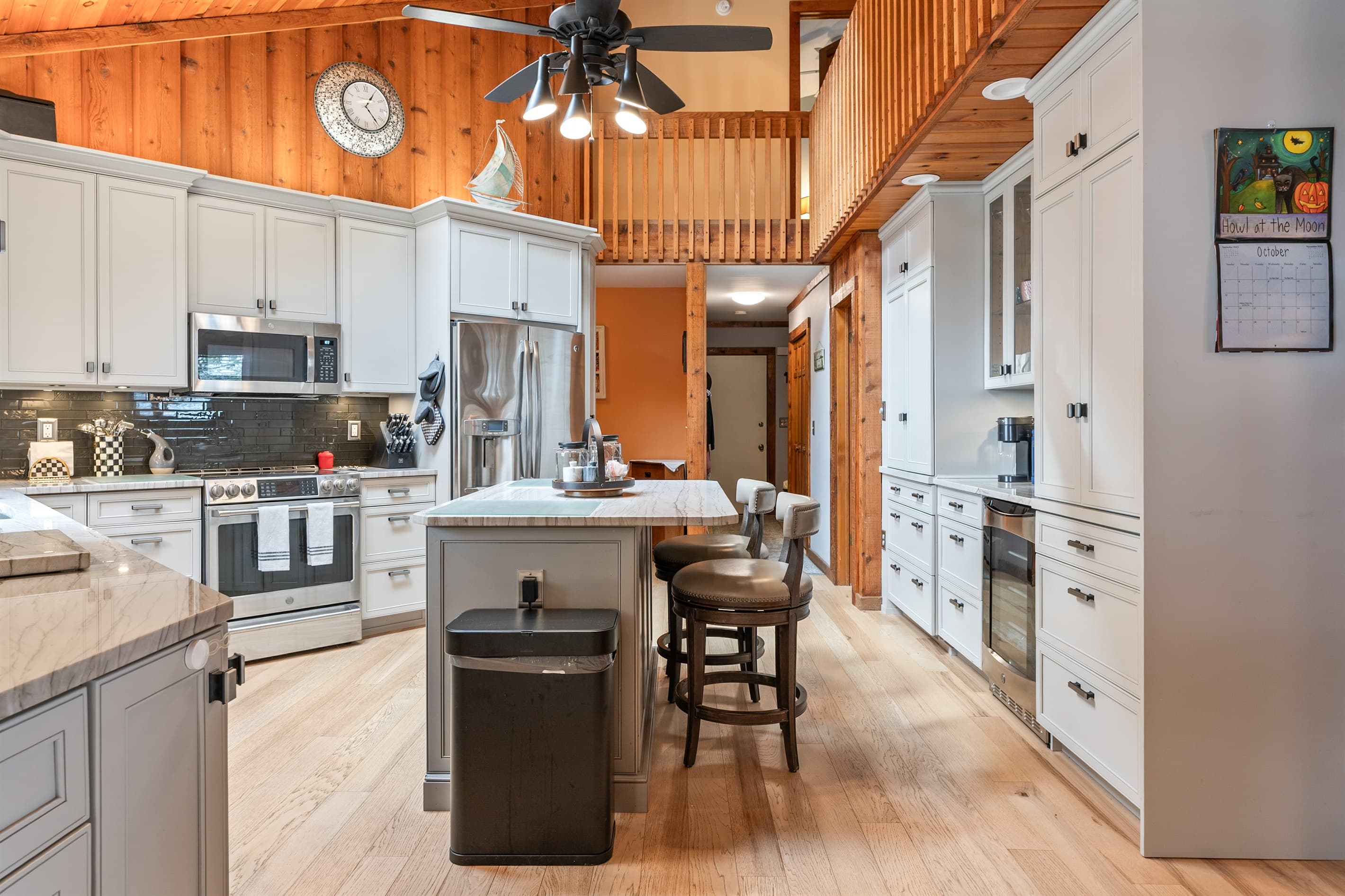 Kitchen with stainless steel appliances and center island