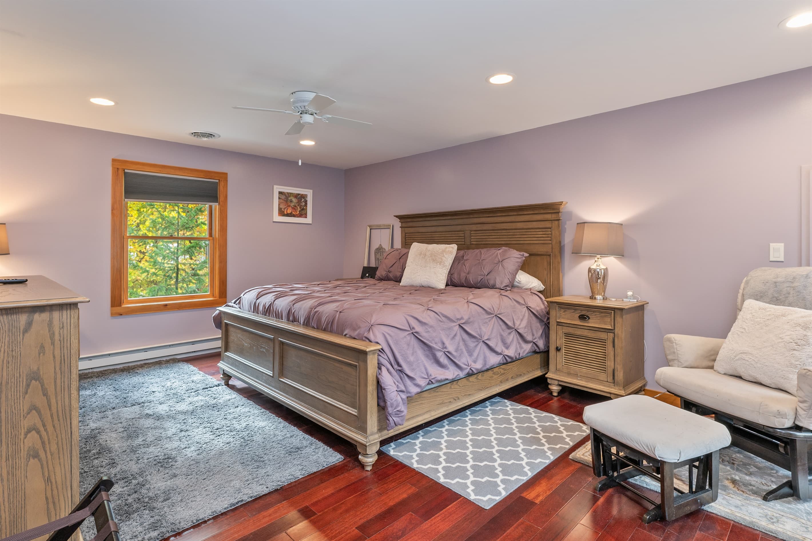 Spacious primary bedroom with sitting area