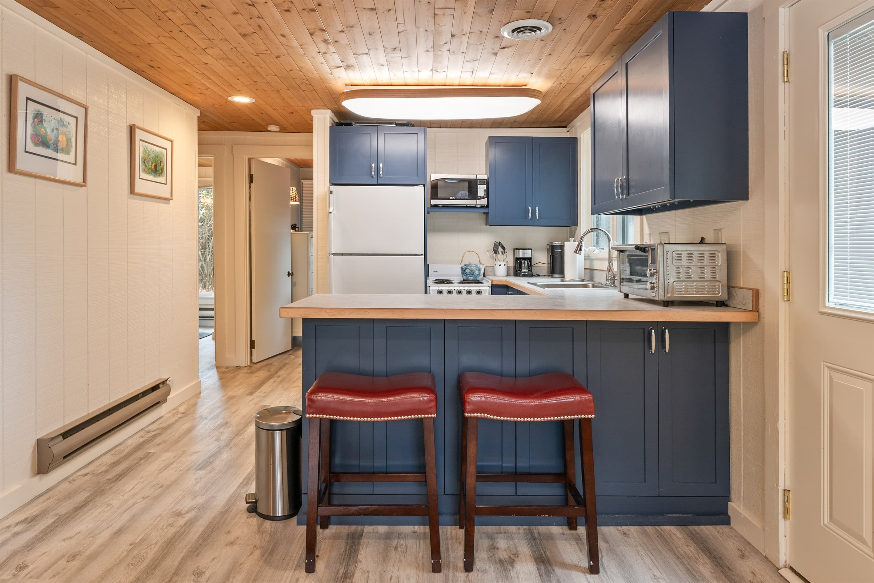 Kitchen with breakfast bar and seating