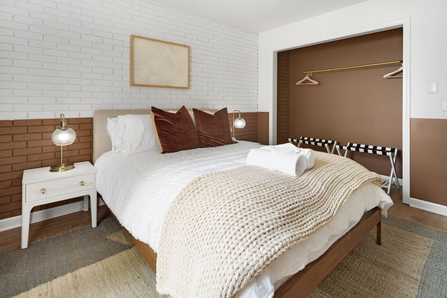 Bedroom with queen bed and matching nightstands
