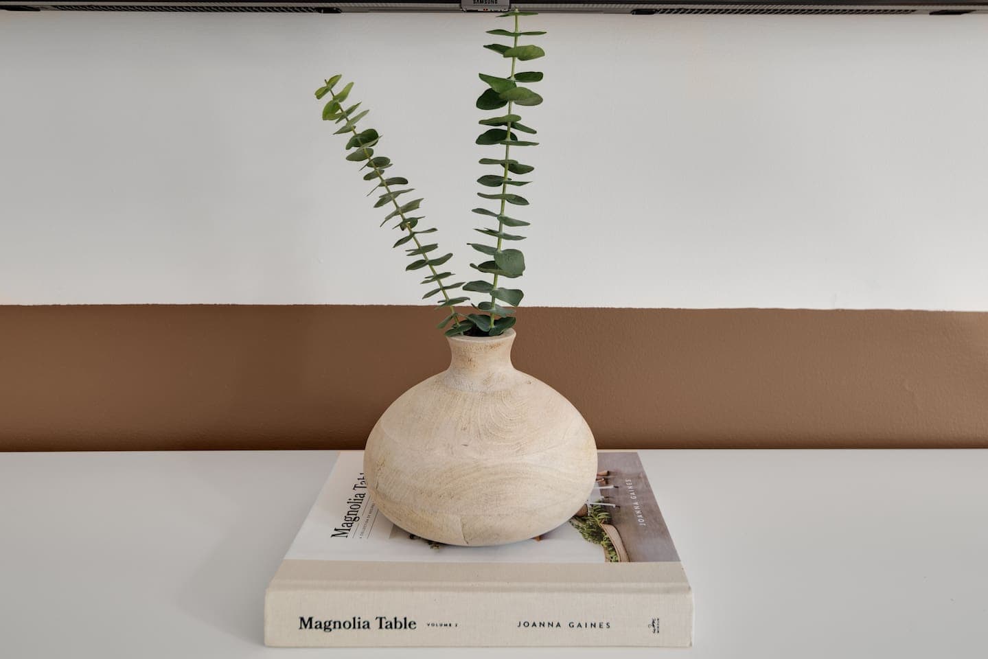 Decorative vase on bedroom shelf