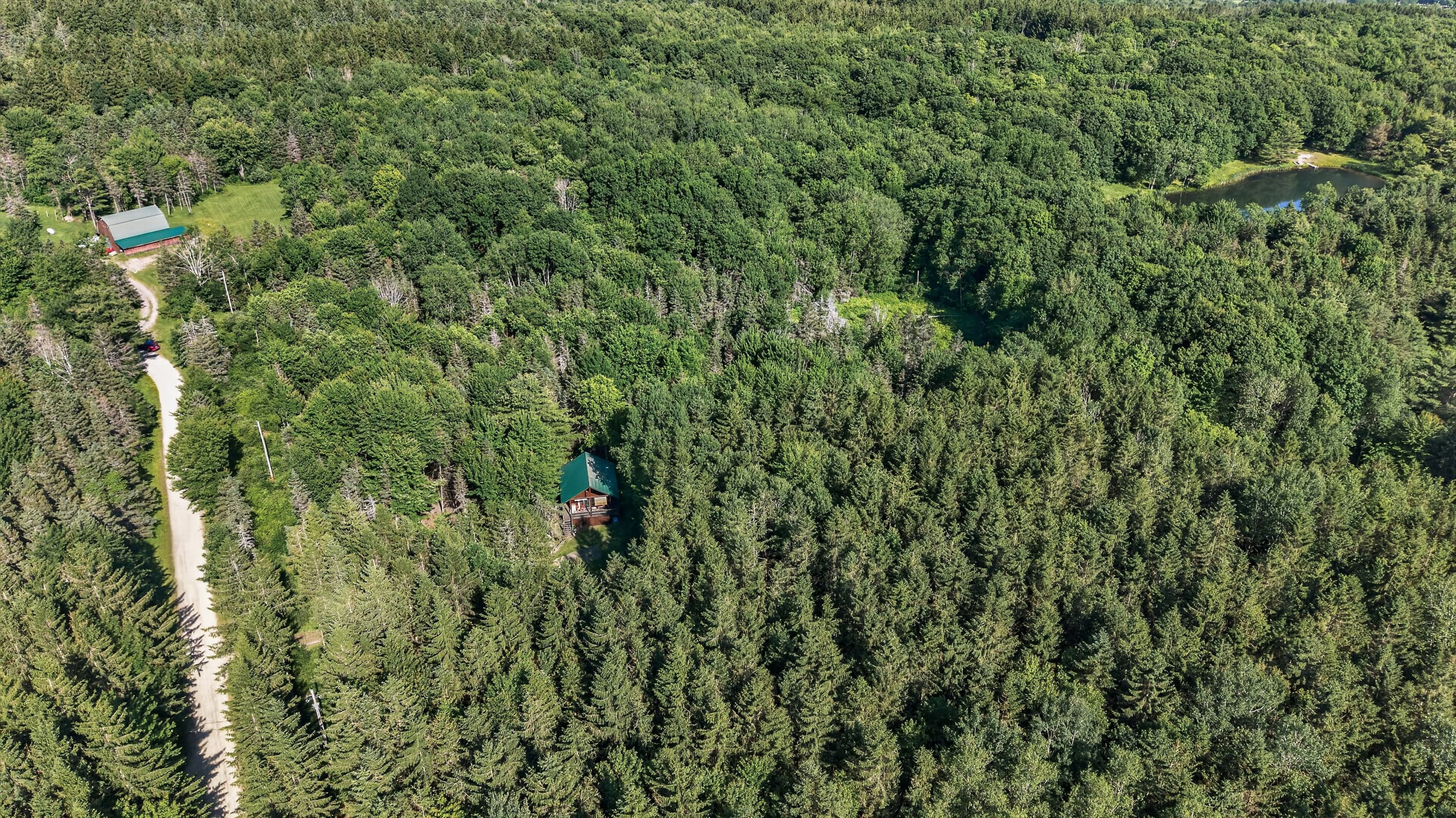 Aerial view of the property and driveway