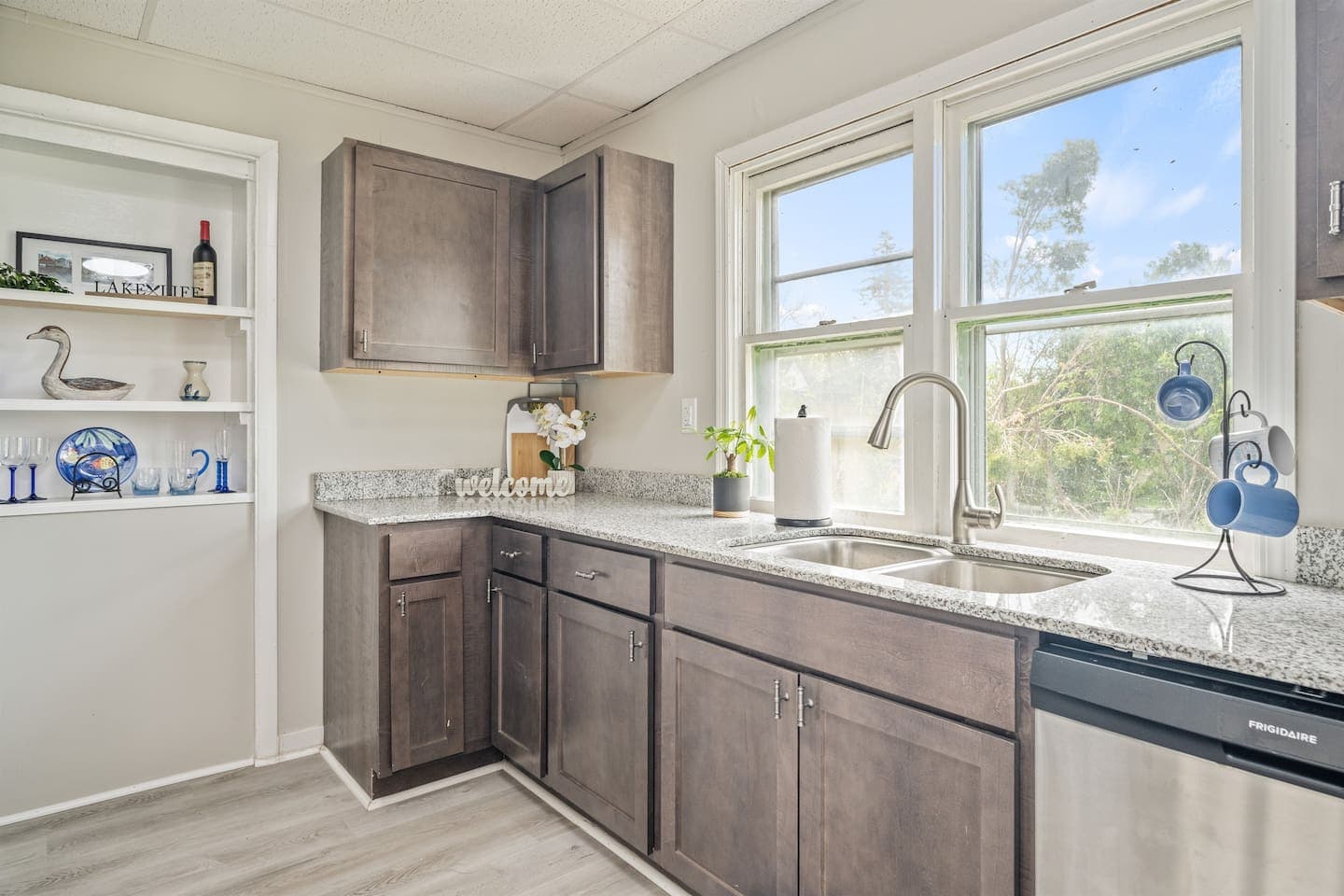 Kitchen sink beneath a large window