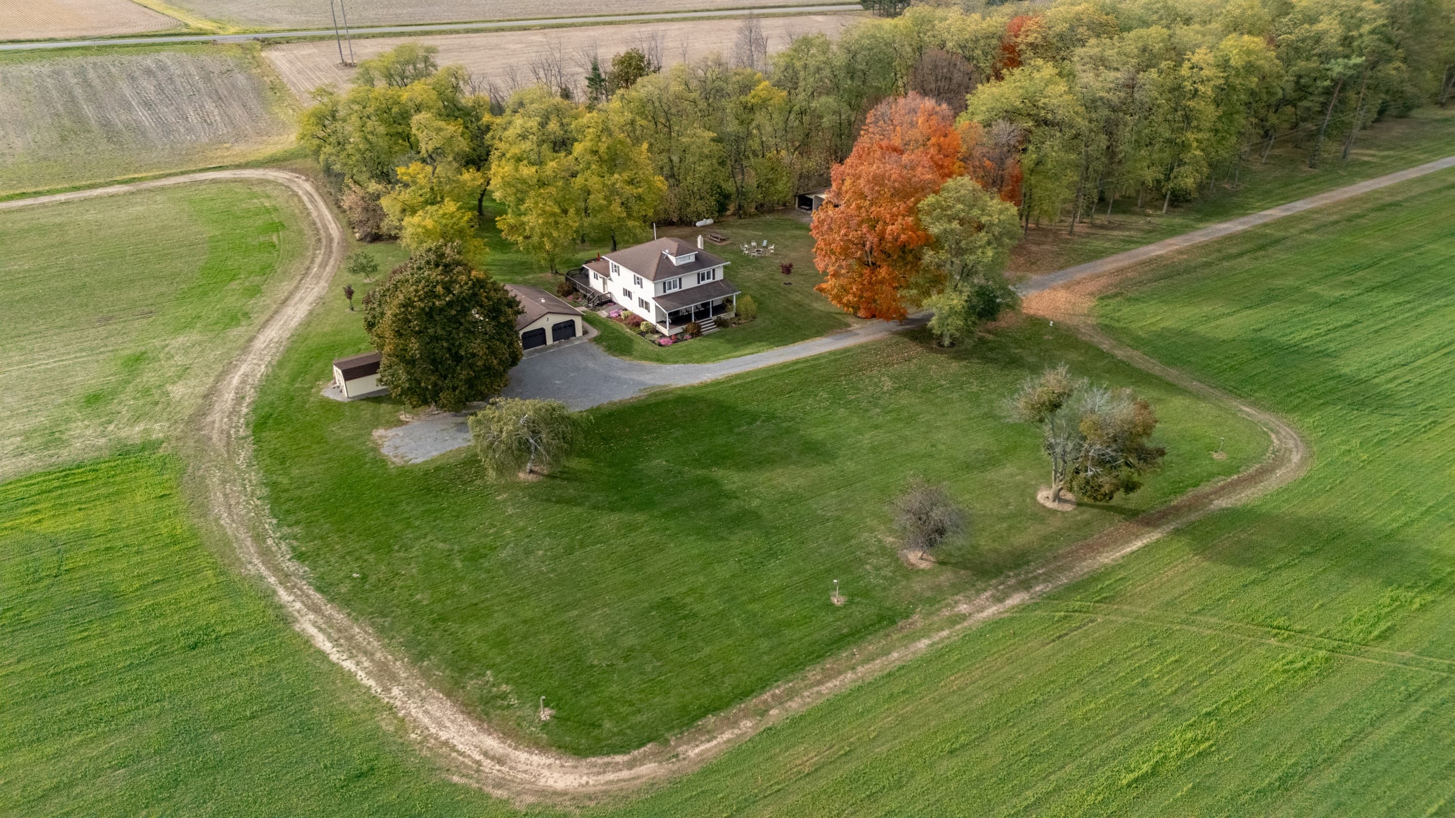 Country property surrounded by open fields