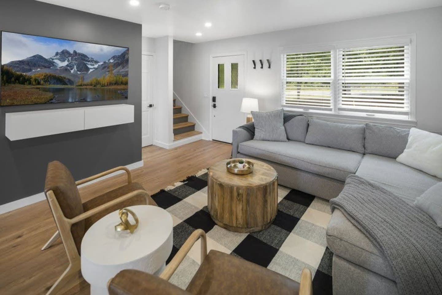 Open living area with wall mounted television