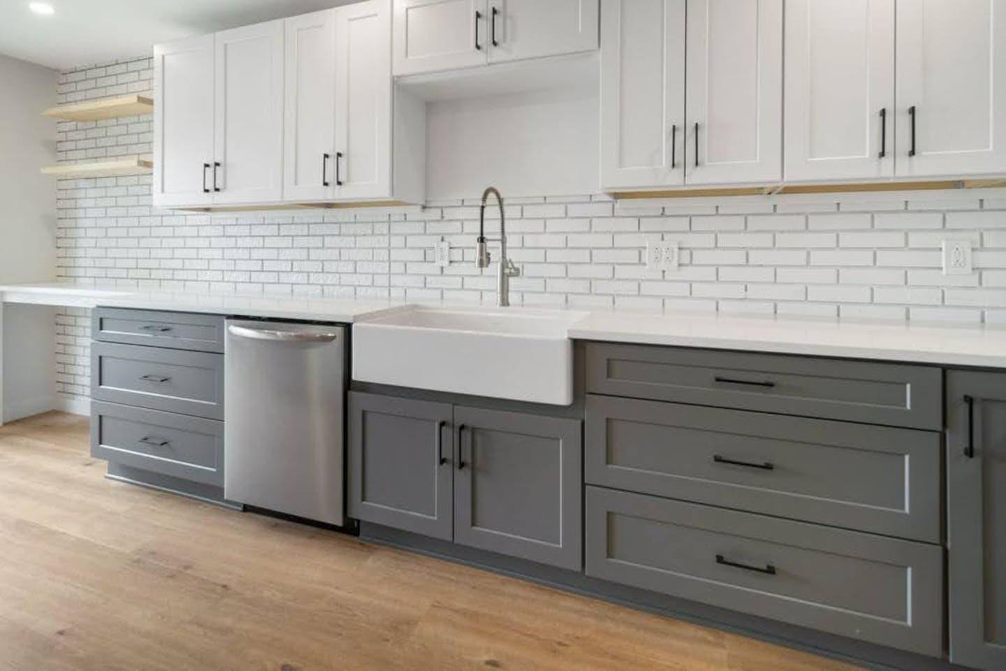 Galley kitchen with two-tone cabinetry