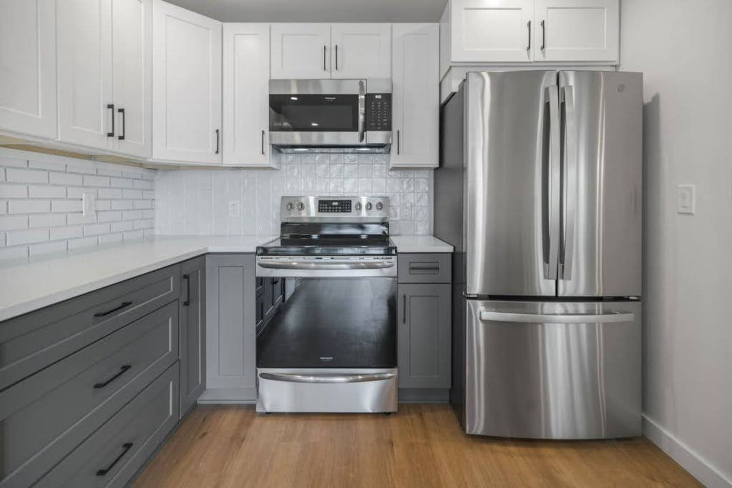 Kitchen with full-size refrigerator