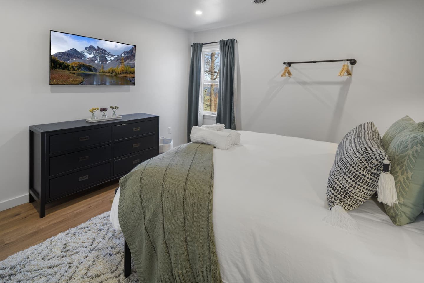 Bedroom with television and dresser