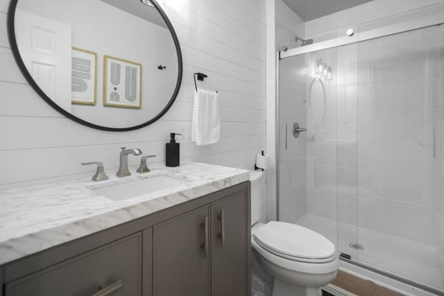 Bathroom vanity and glass shower