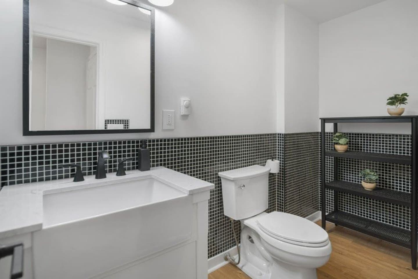 Bathroom vanity with tiled backsplash