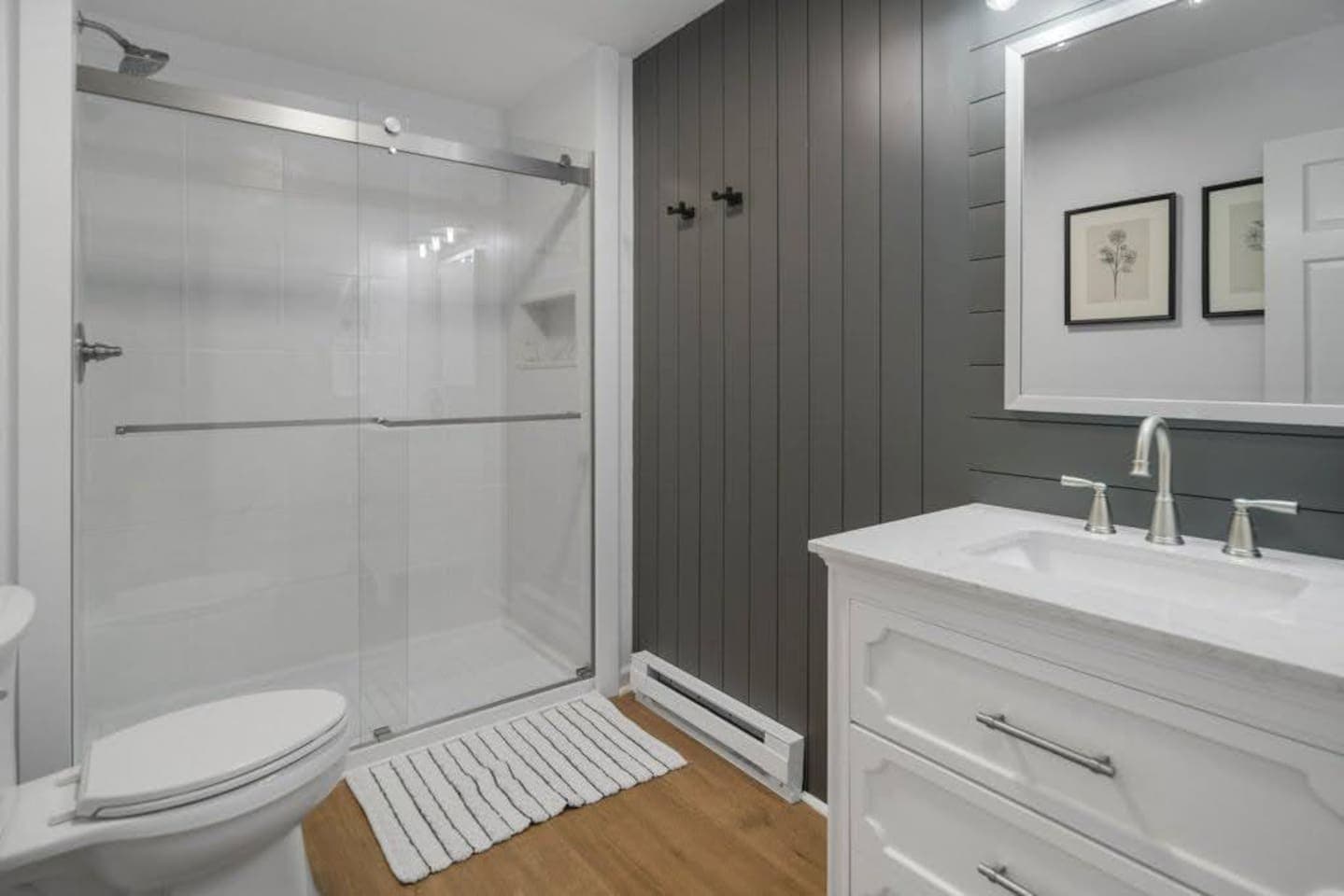 Bathroom with glass shower and vanity