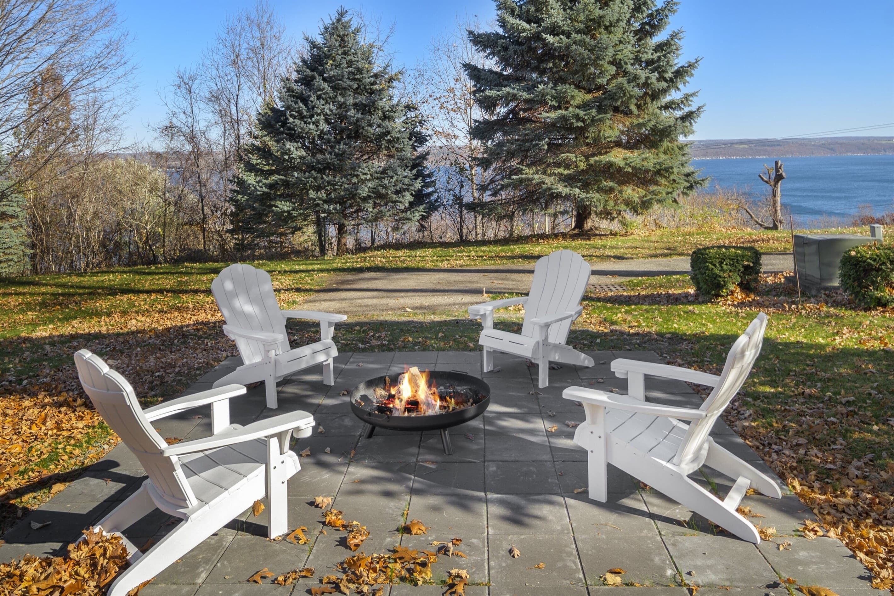 Adirondack chairs surrounding the fire pit