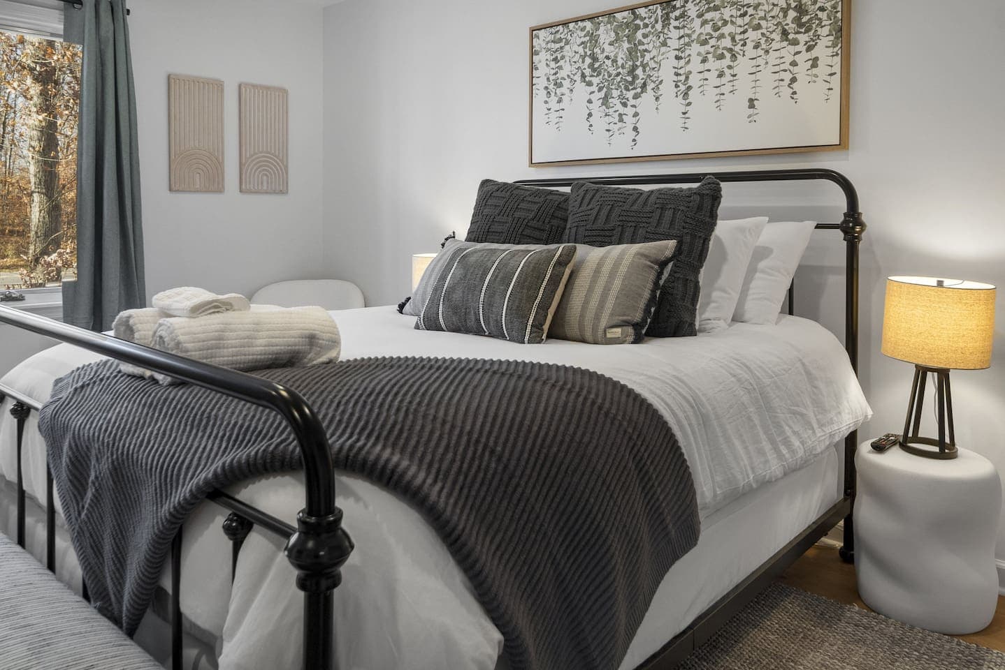 Bedroom with black metal bed frame