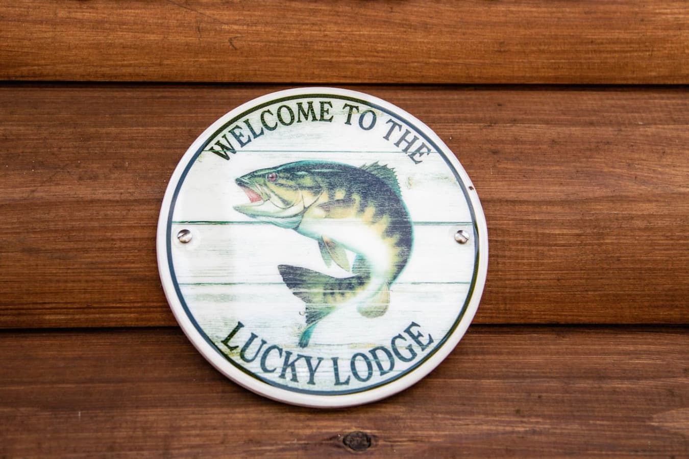 LL Fish sign on house