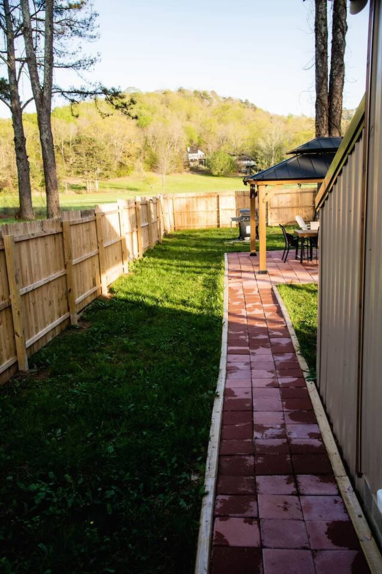 LL Outside view from side door to gazebo back